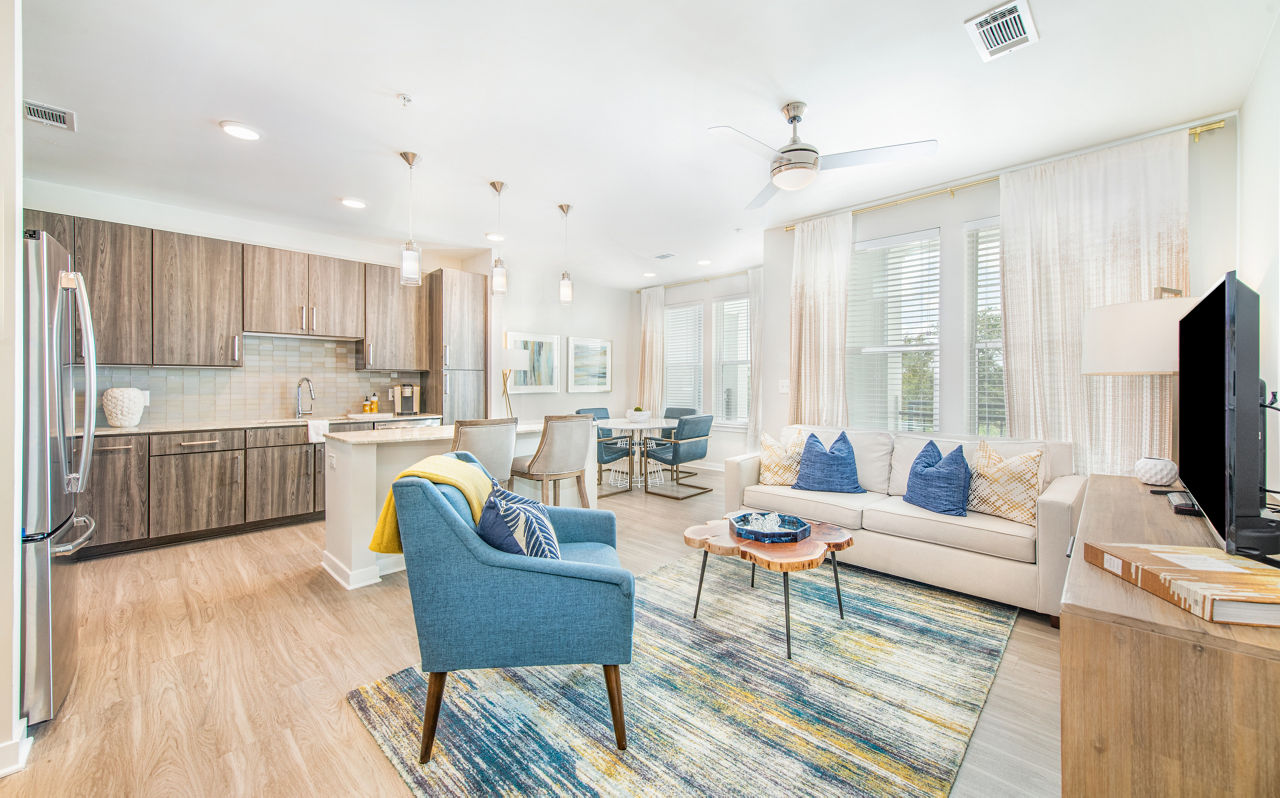 Contemporary living room with stylish furnishings in Overture Daniel Island Apartments