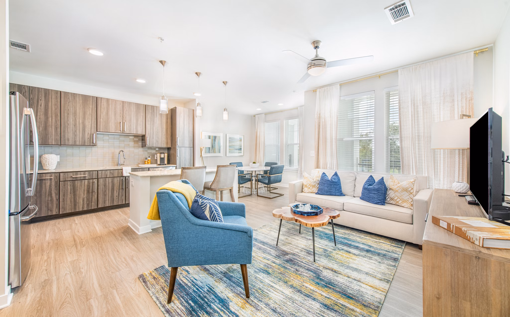 Contemporary living room with stylish furnishings in Overture Daniel Island Apartments