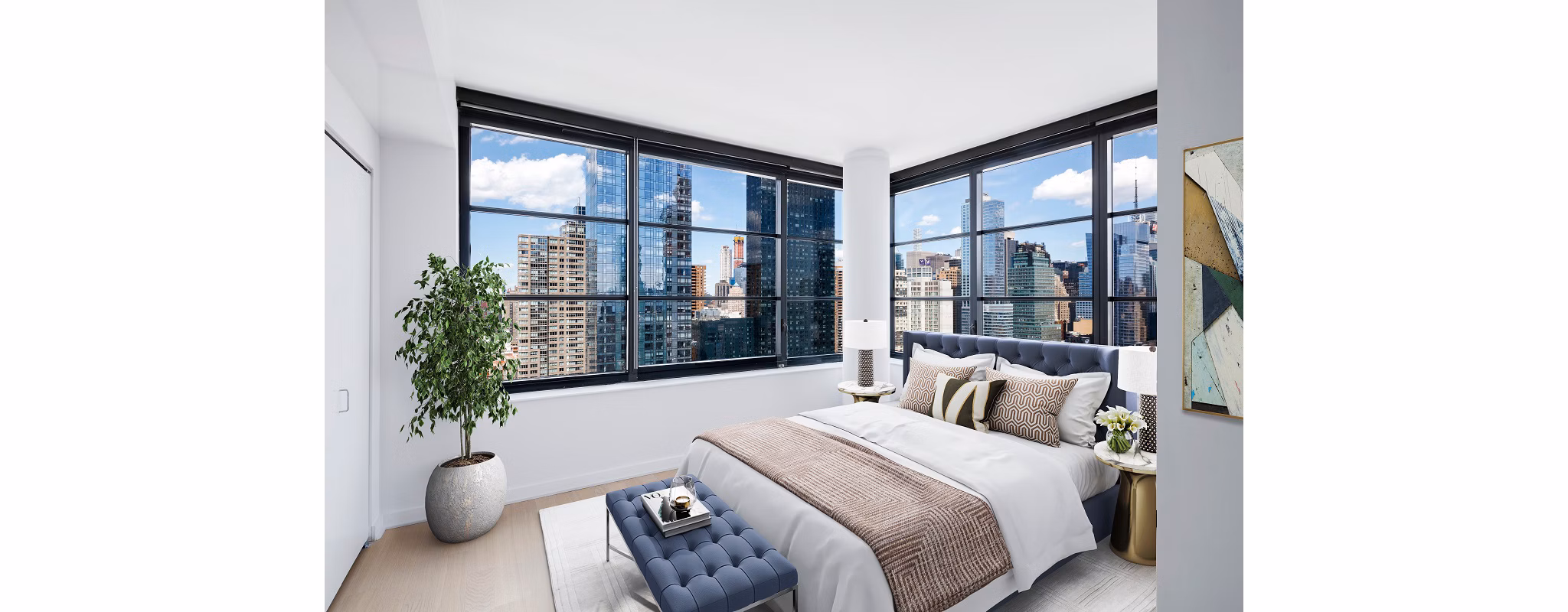 Stylish bedroom with modern decor and ample natural light at Henry Hall Apartments