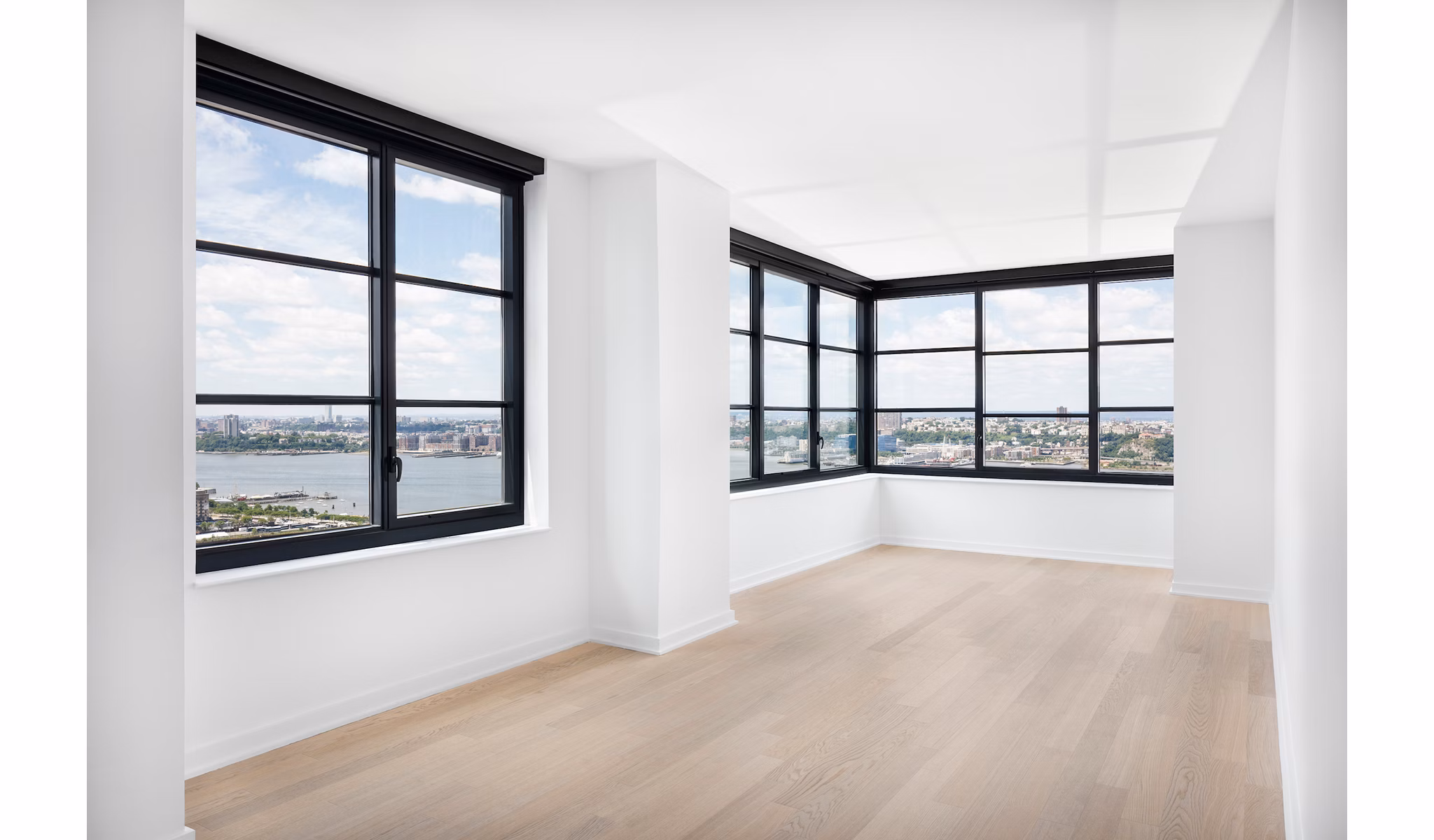 Elegant bedroom with king-size bed and modern decor at Henry Hall Apartments