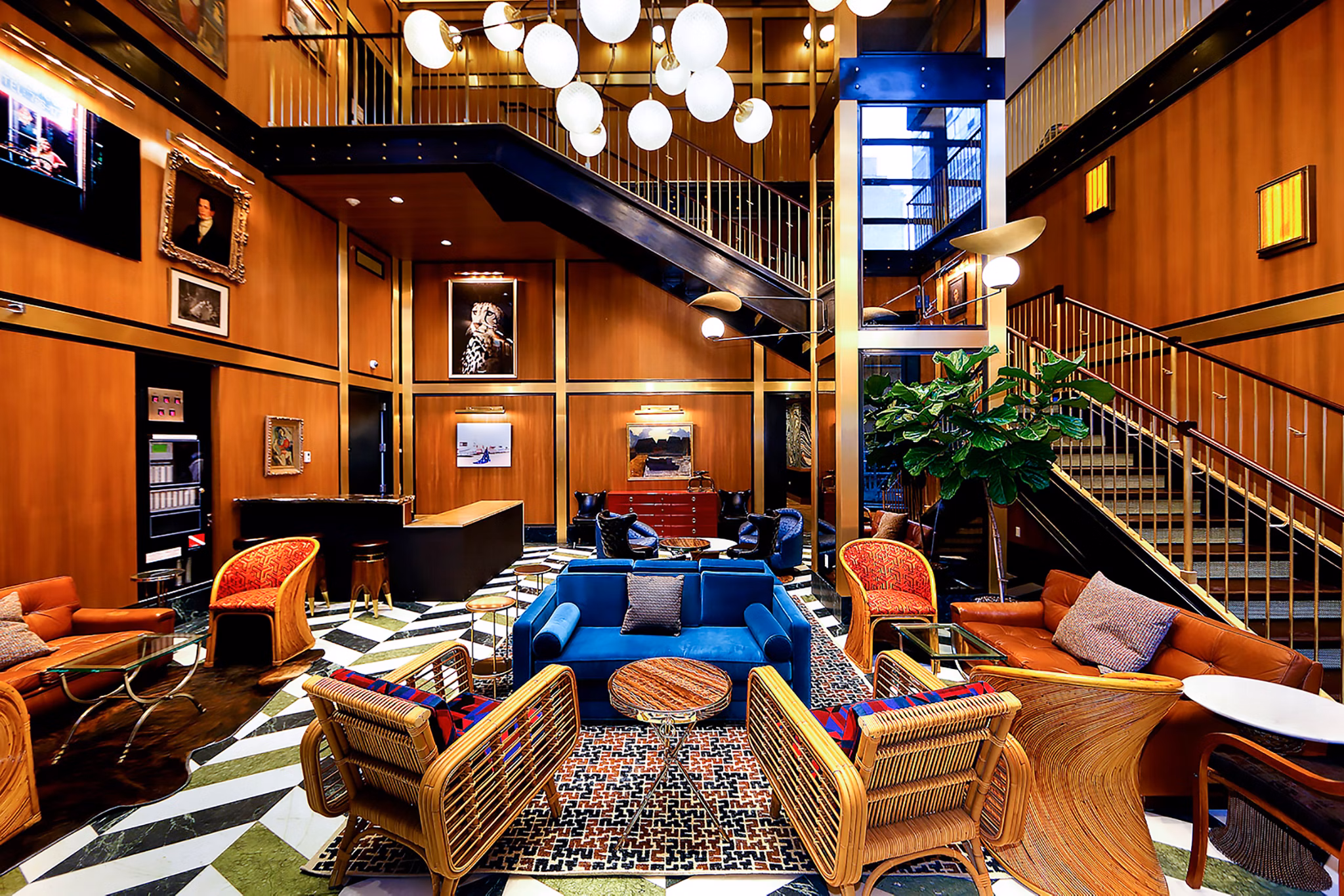 Clubhouse with modern decor and comfortable seating at Henry Hall Apartments luxury community
