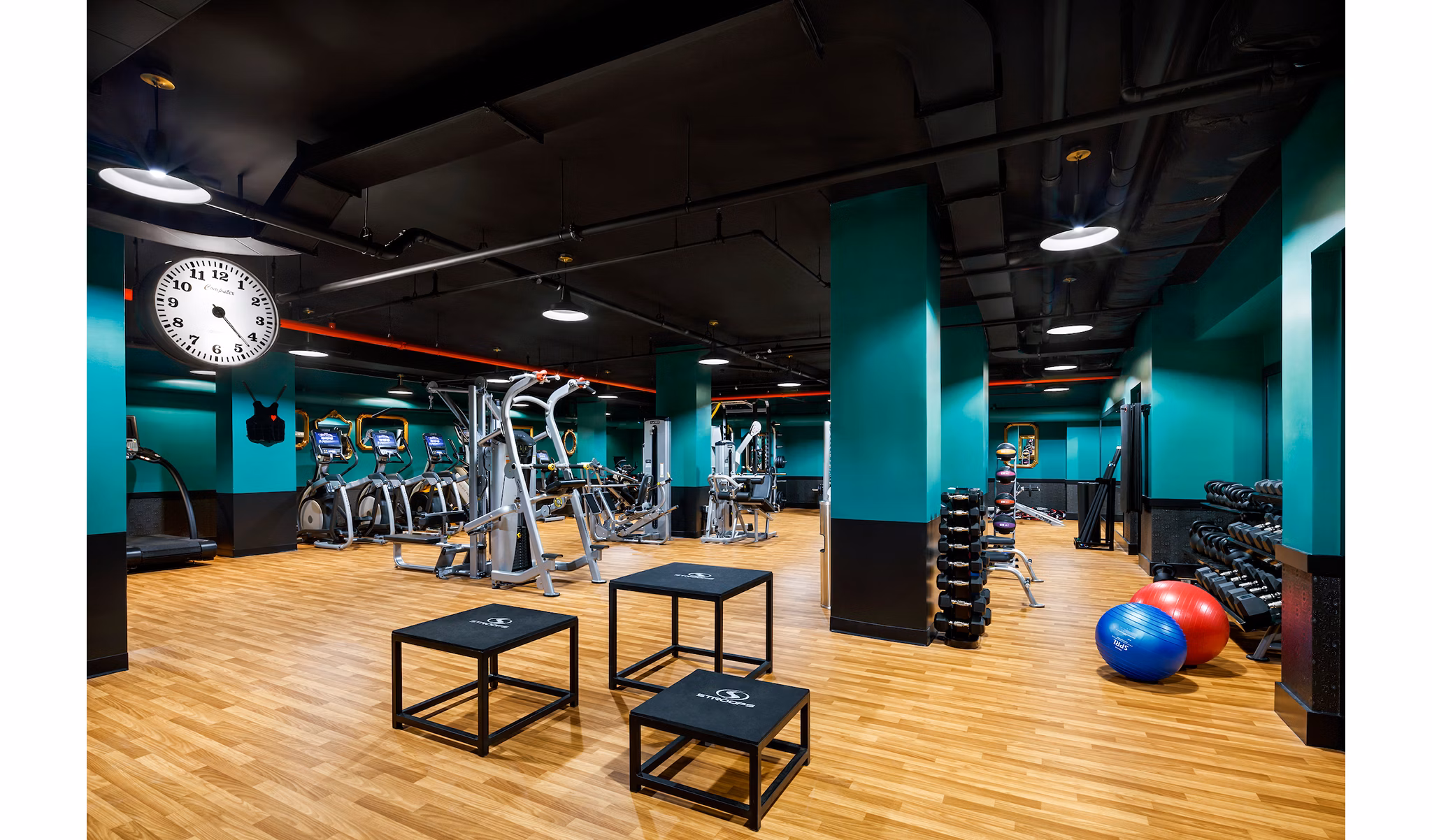 State-of-the-art fitness center with modern equipment at Henry Hall Apartments