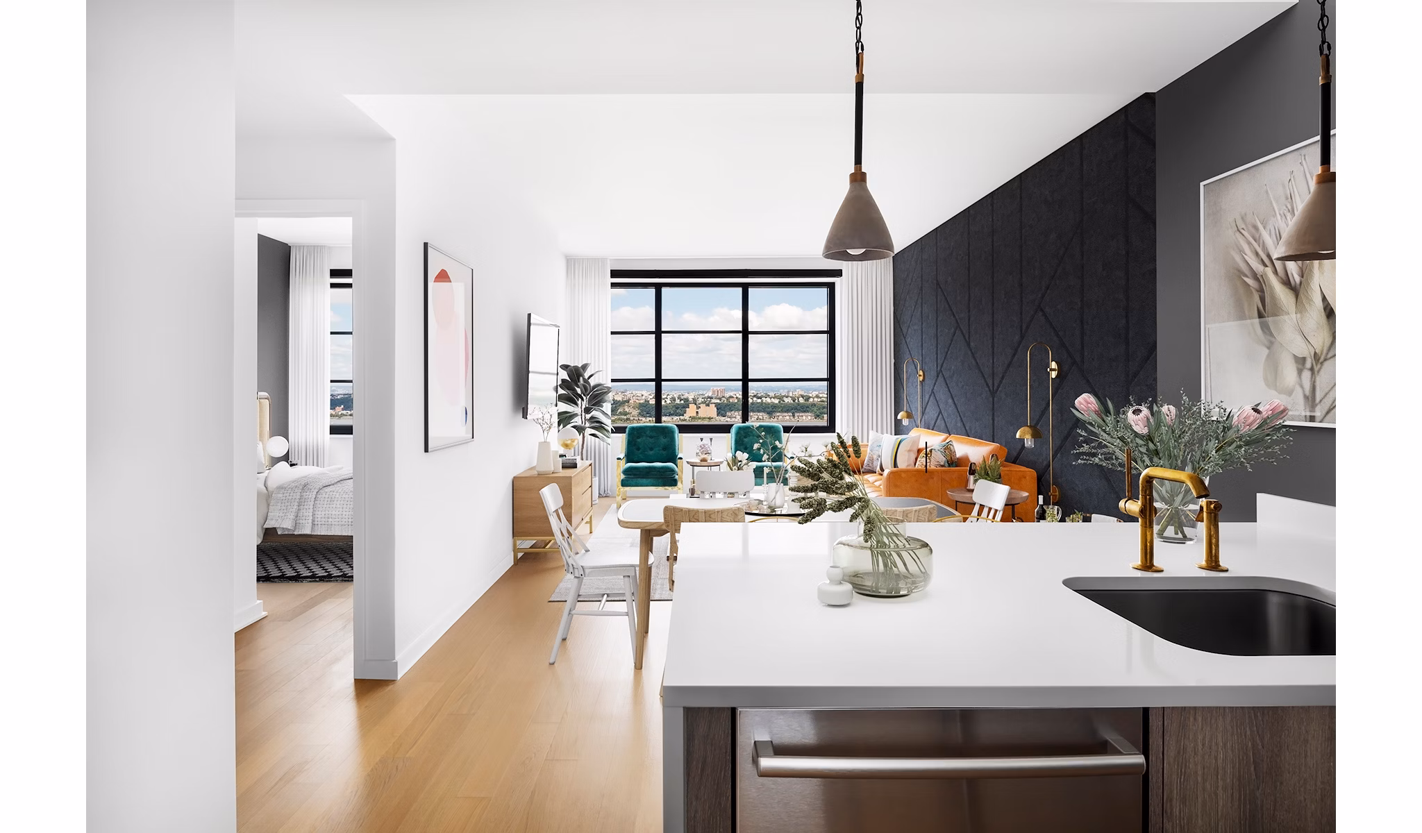 Contemporary kitchen featuring sleek cabinetry and modern appliances at Henry Hall Apartments