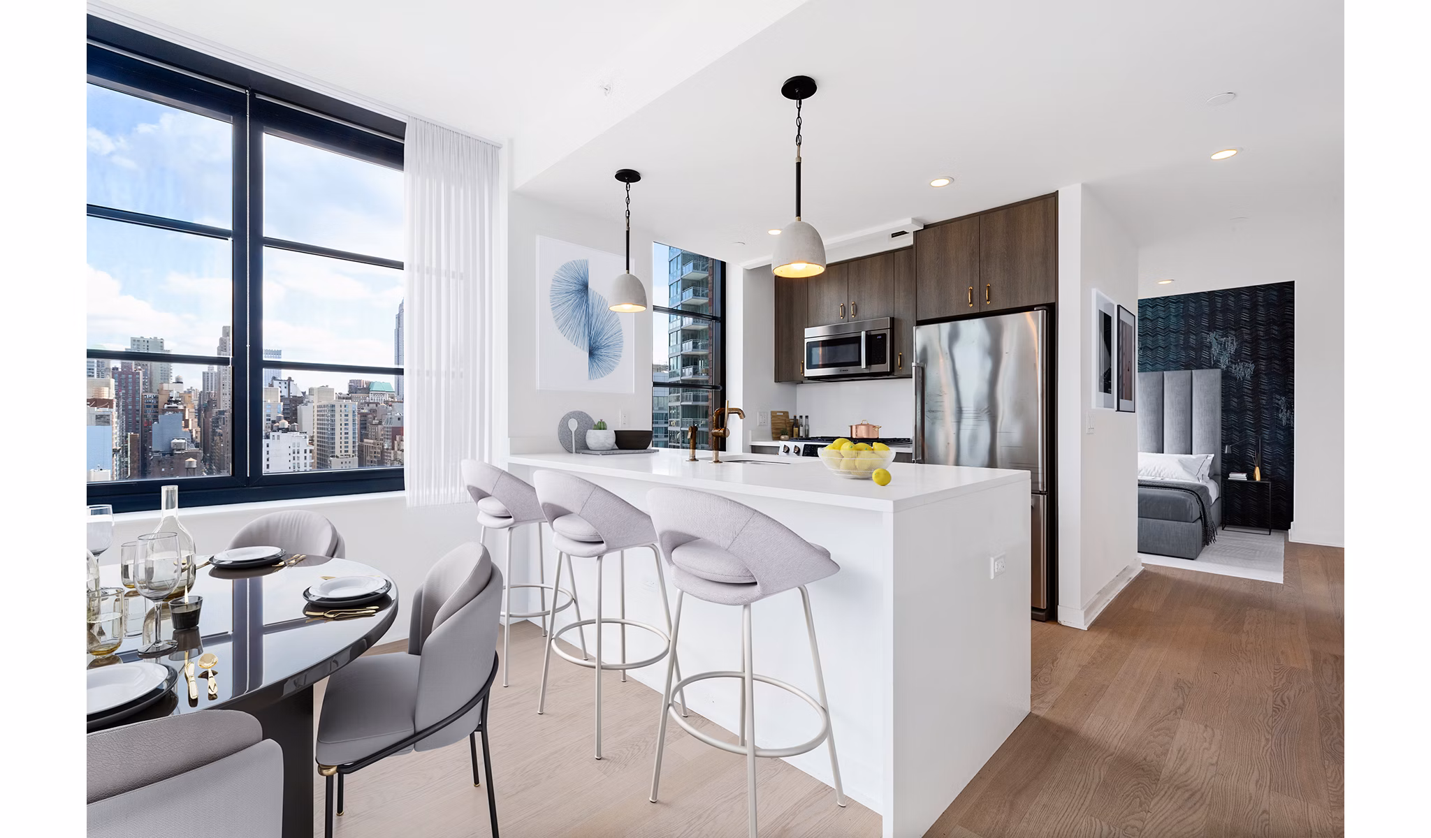 Modern kitchen with stainless steel appliances in Henry Hall Apartments