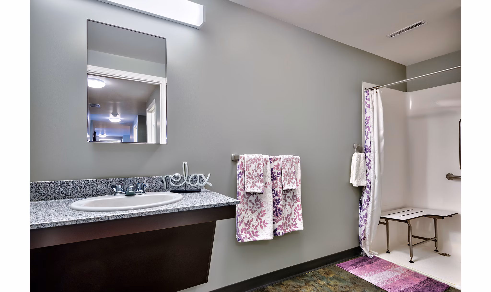 Modern bathroom with sleek fixtures in Campus West Apartments, offering luxury student living near campus