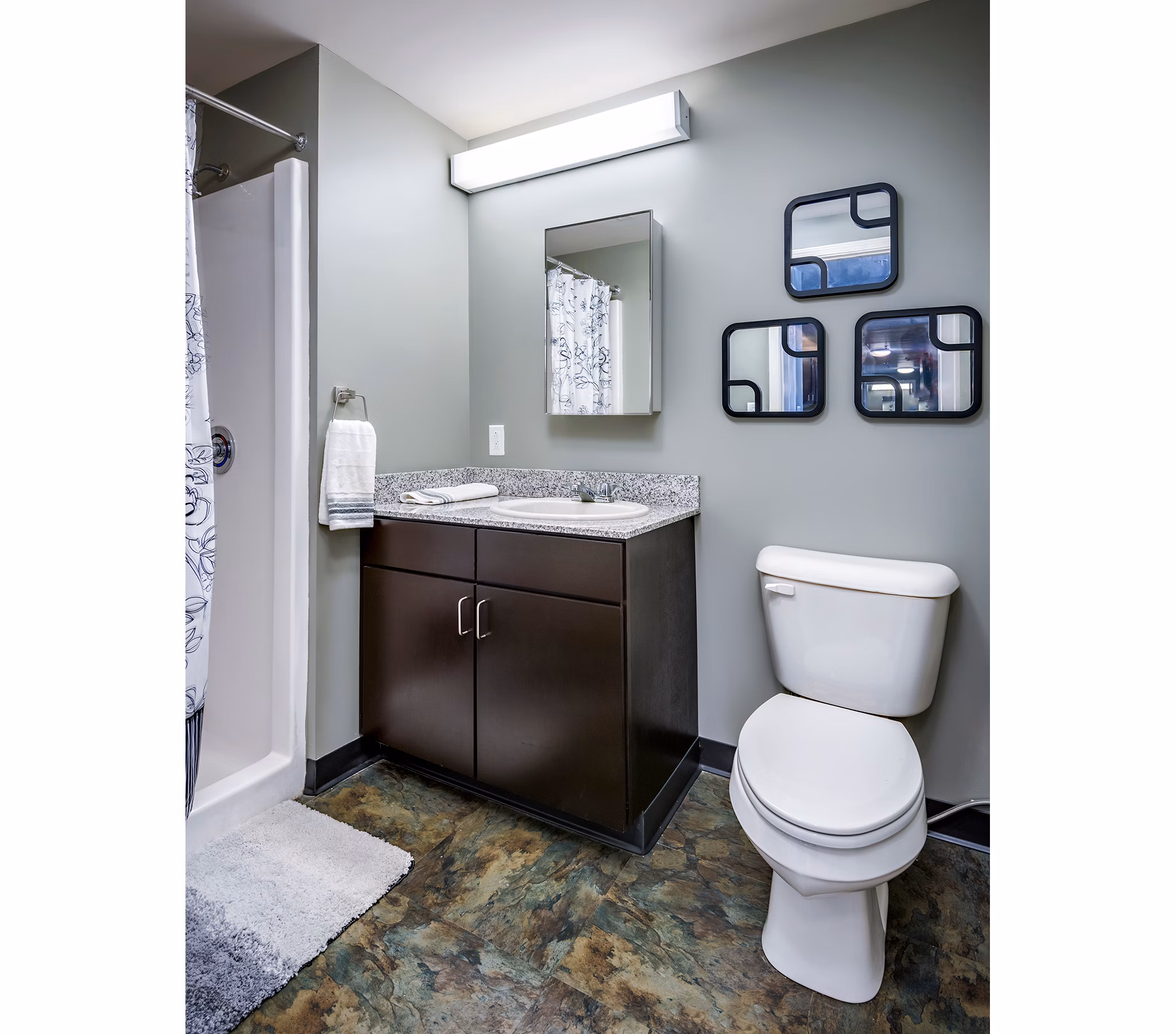 Modern bathroom with sleek fixtures at Campus West Apartments