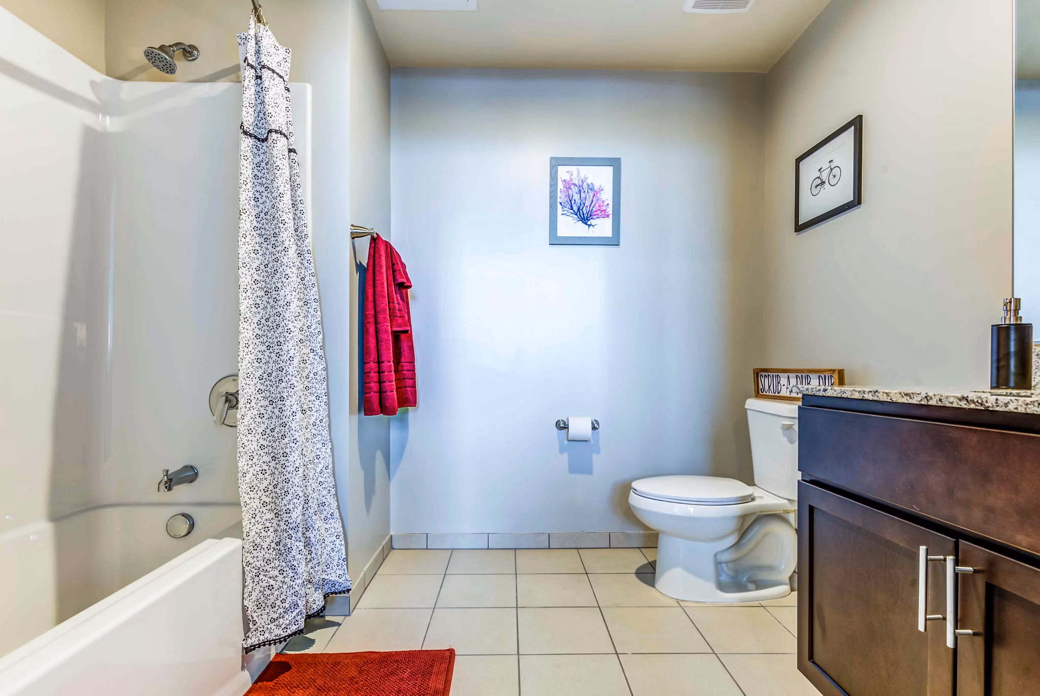 Modern bathroom with sleek fixtures at Maplewood Apartments, luxury living by Greystar