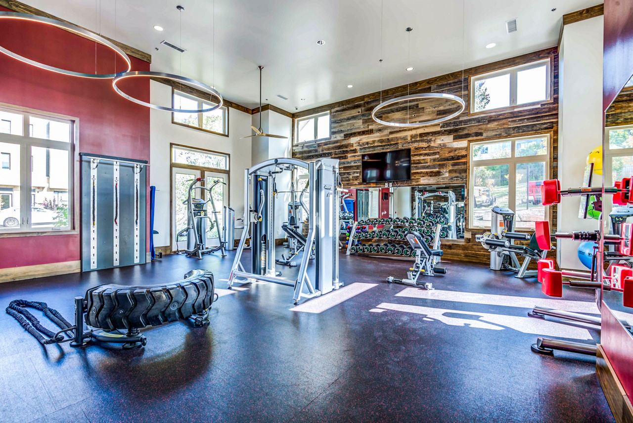 Modern fitness center with state-of-the-art equipment at Maplewood Apartments, perfect for active lifestyles
