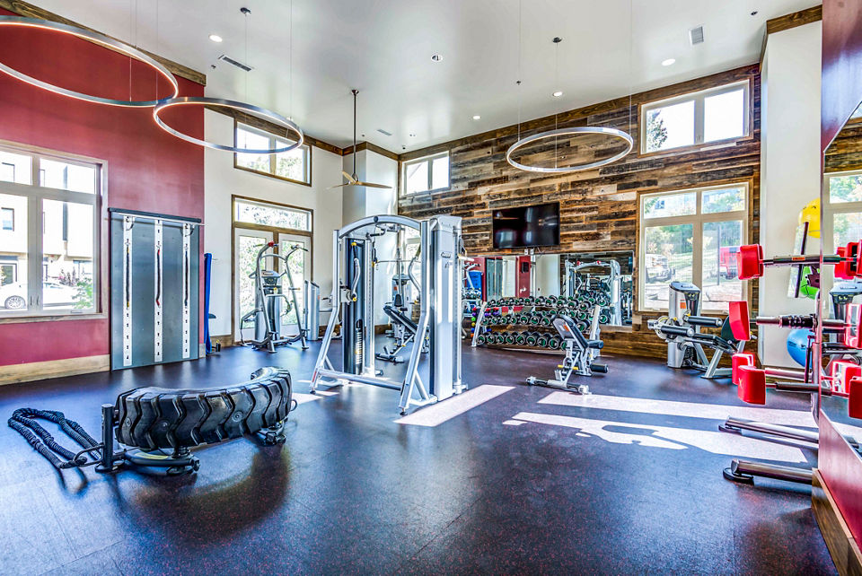 Modern fitness center with state-of-the-art equipment at Maplewood Apartments, perfect for active lifestyles