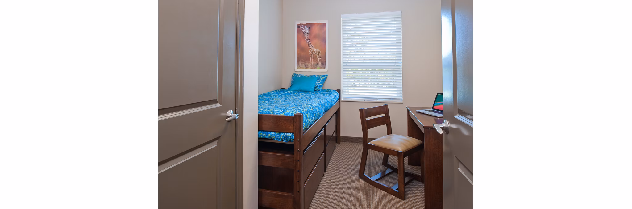 Cozy bedroom featuring modern decor at Centennial Hall Apartments