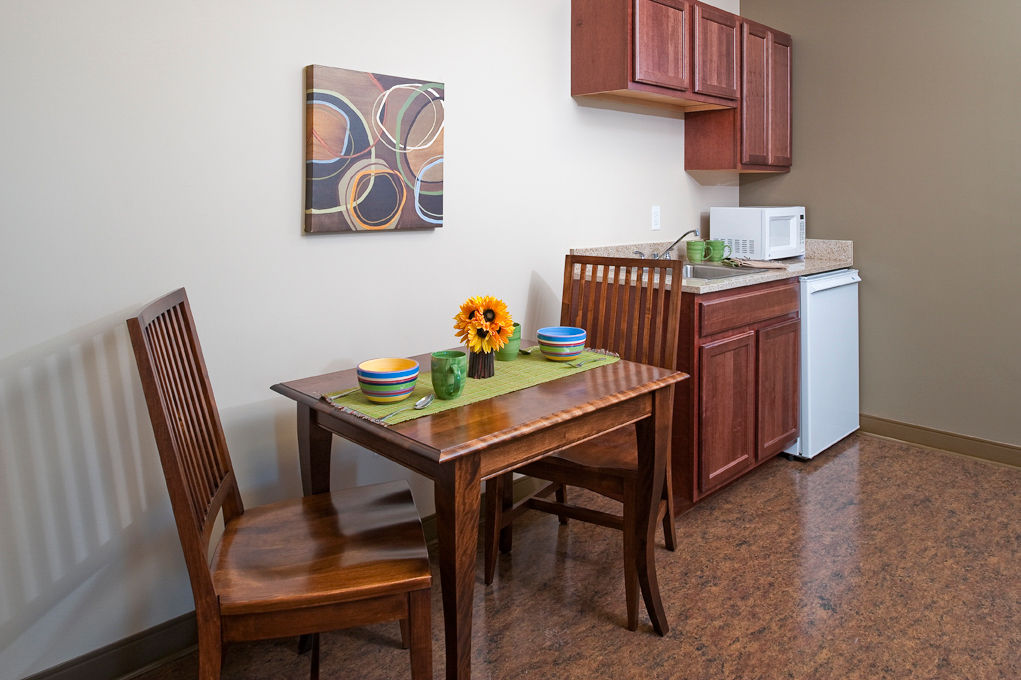 Elegant dining room with modern furnishings at Centennial Hall Apartments