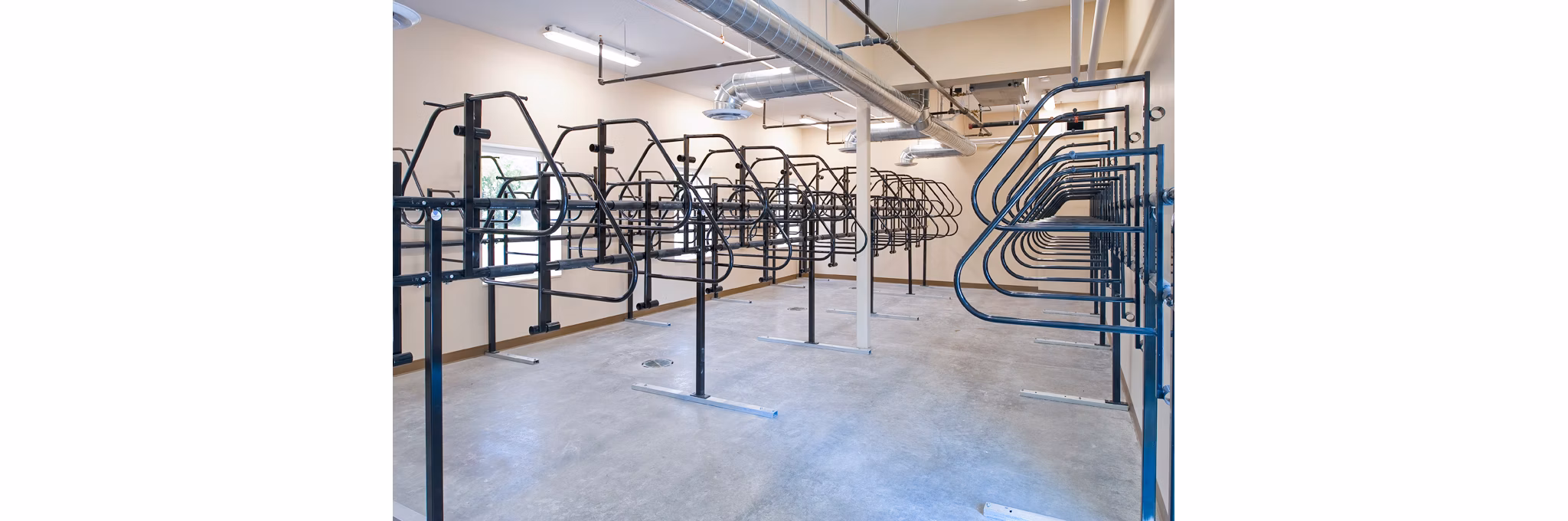 Secure bike storage area at Centennial Hall Apartments, perfect for cycling enthusiasts seeking convenient access in luxury apartments
