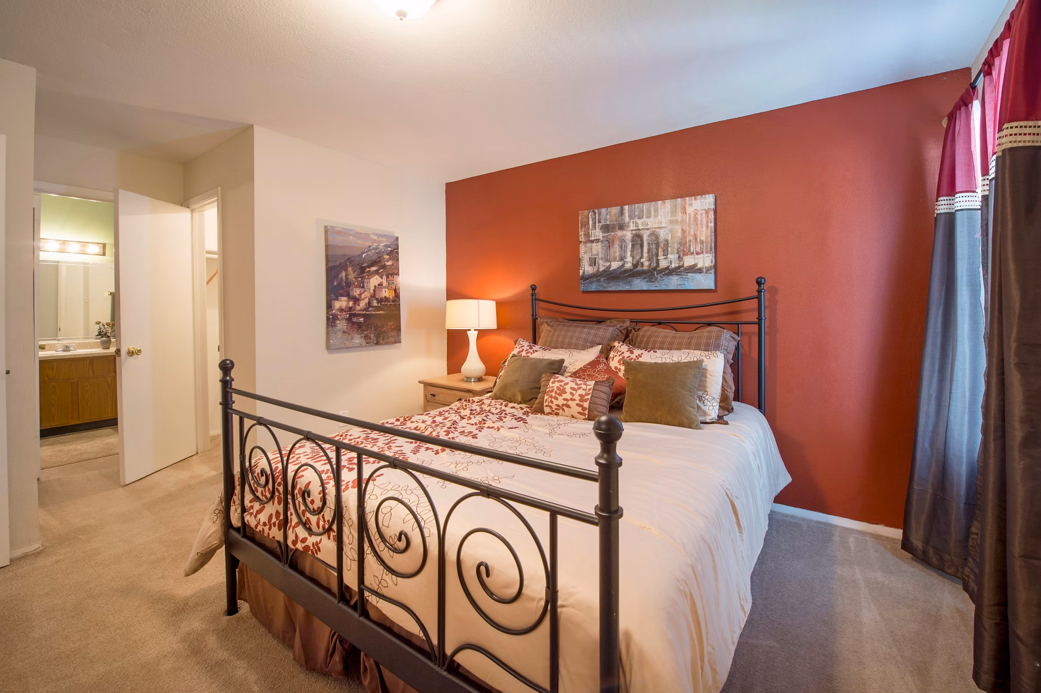 Cozy bedroom with stylish decor and natural light at Willow Springs Apartments