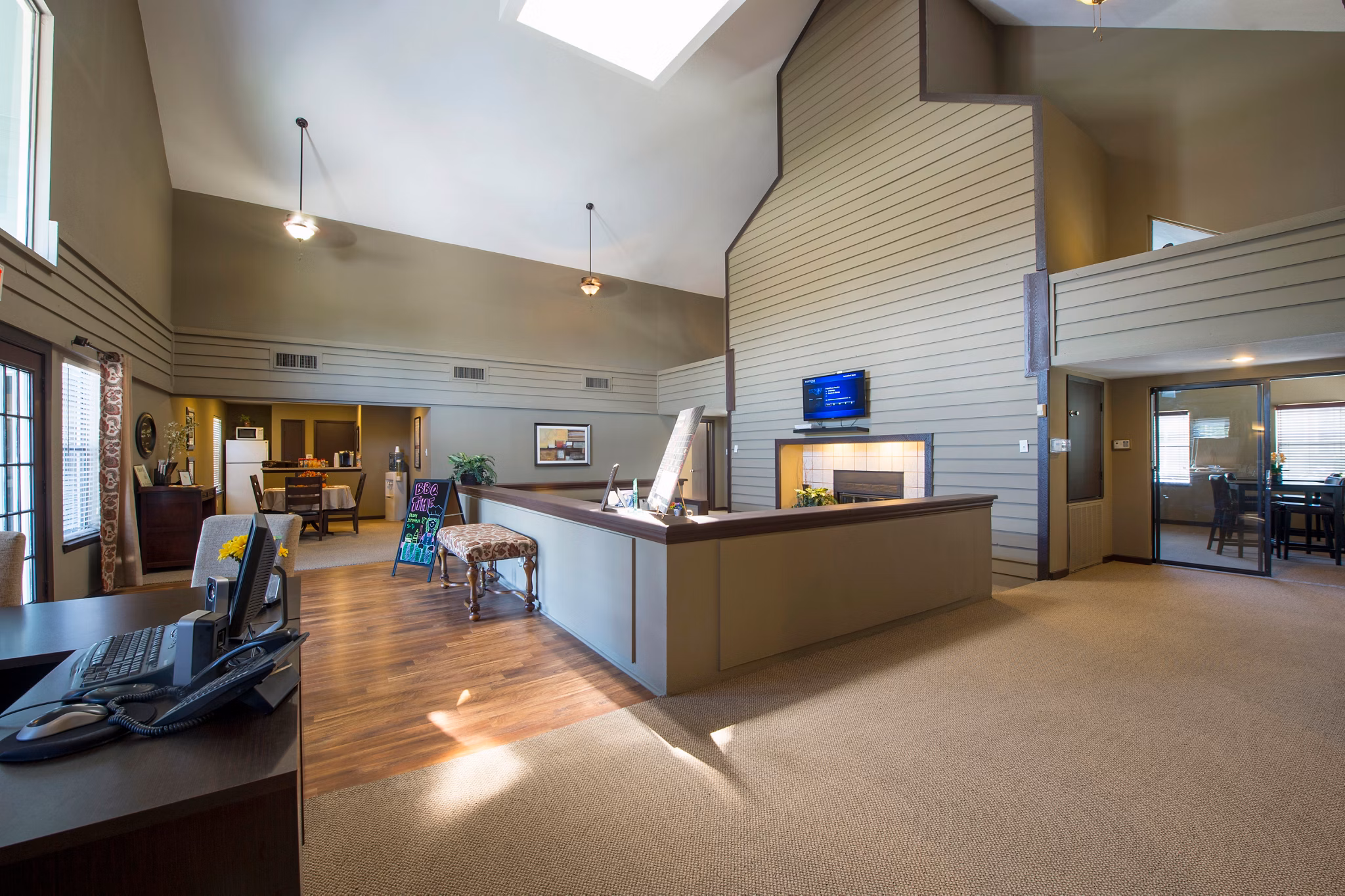 Clubhouse featuring modern furnishings and large seating areas at Willow Springs Apartments Ideal for luxury apartment community events and gatherings