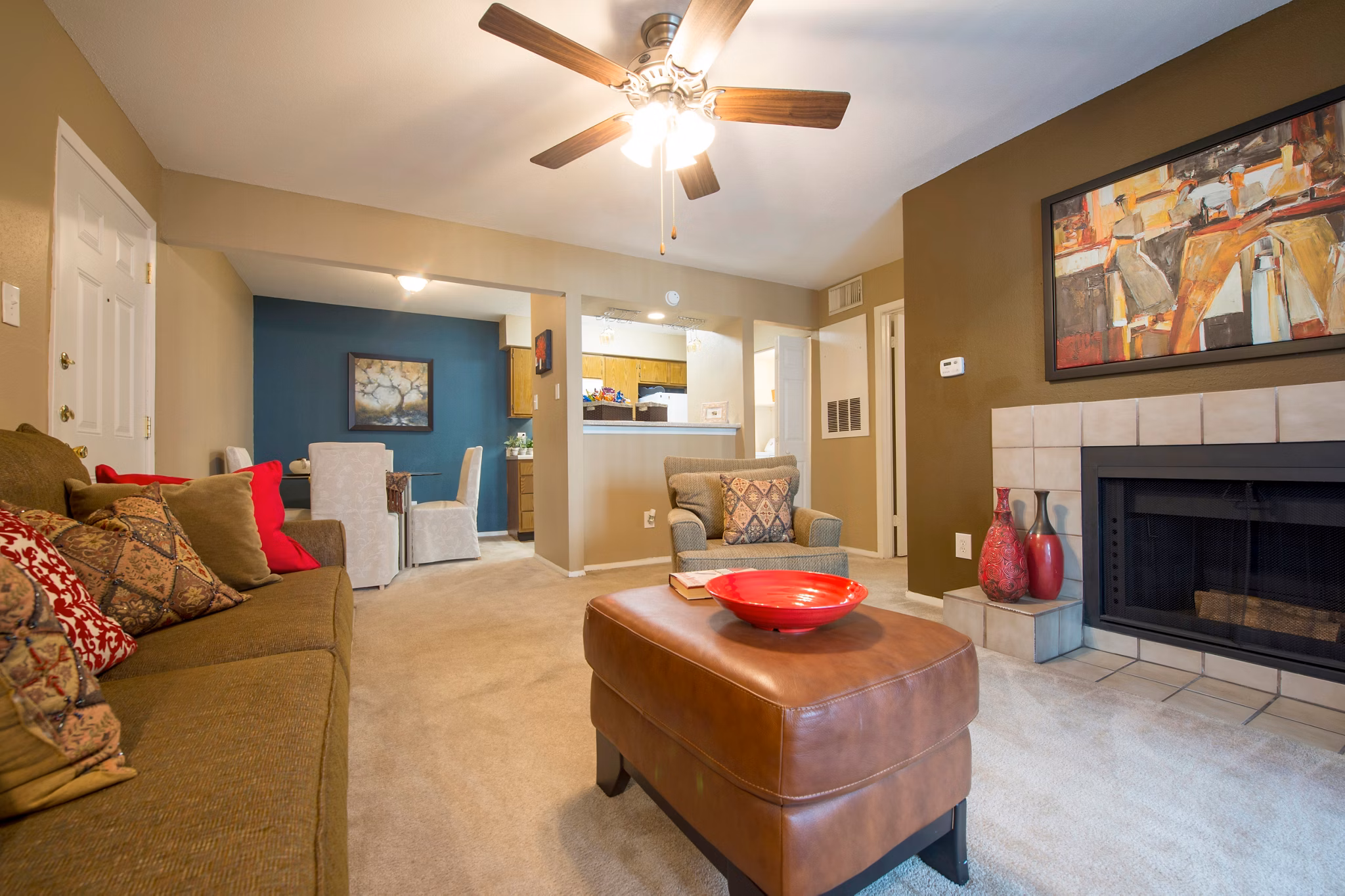 Inviting living room with modern decor and ample natural light at Willow Springs Apartments