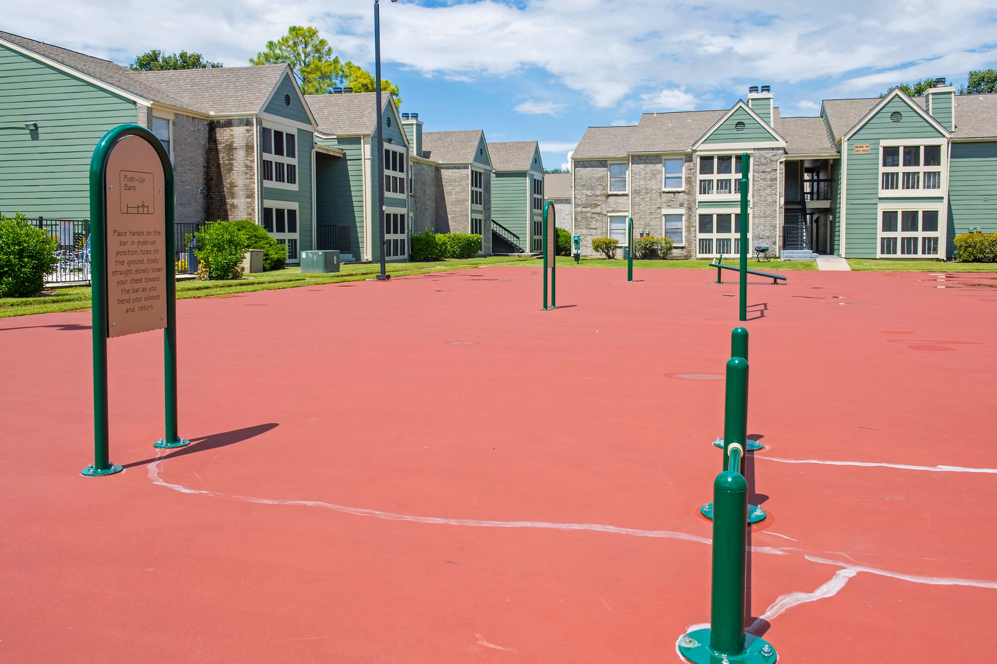 Modern playground with vibrant equipment at Willow Springs Apartments, ideal for outdoor fun and recreation in a family-friendly environment