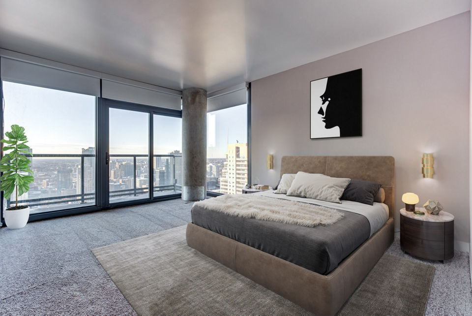 Spacious bedroom with modern decor at State & Grand Apartments in the heart of the city