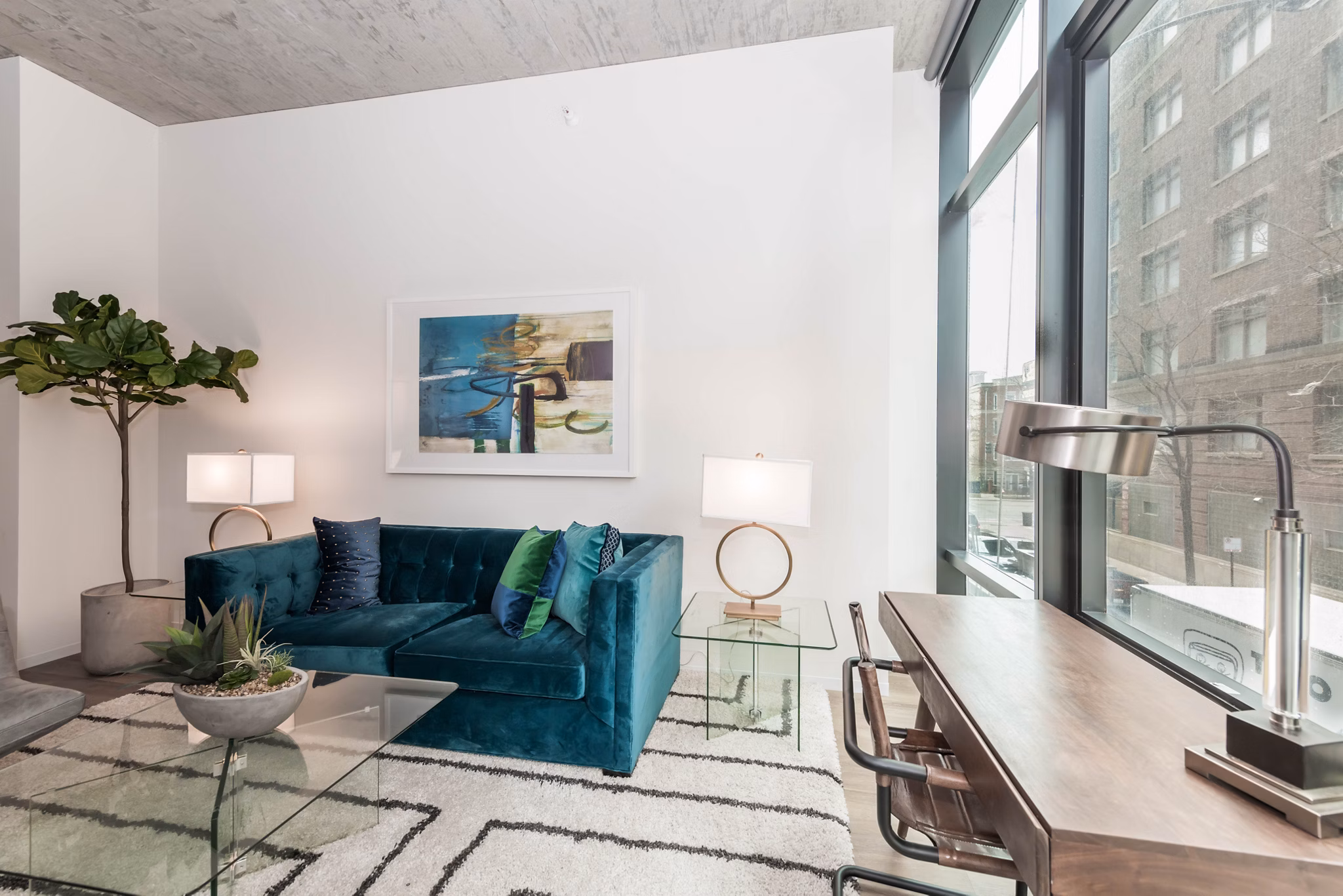 Spacious living room with modern decor at Coeval Apartments featuring luxury amenities