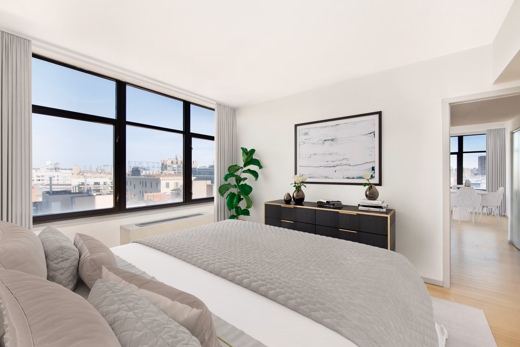 Bedroom featuring modern decor and large windows in 424 Bedford luxury apartments