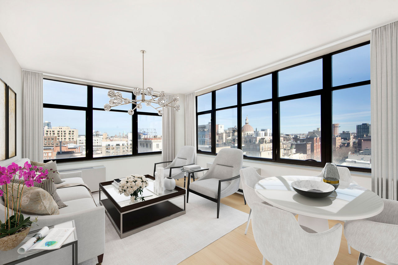 Spacious living room with stylish decor and large windows in 424 Bedford luxury apartments