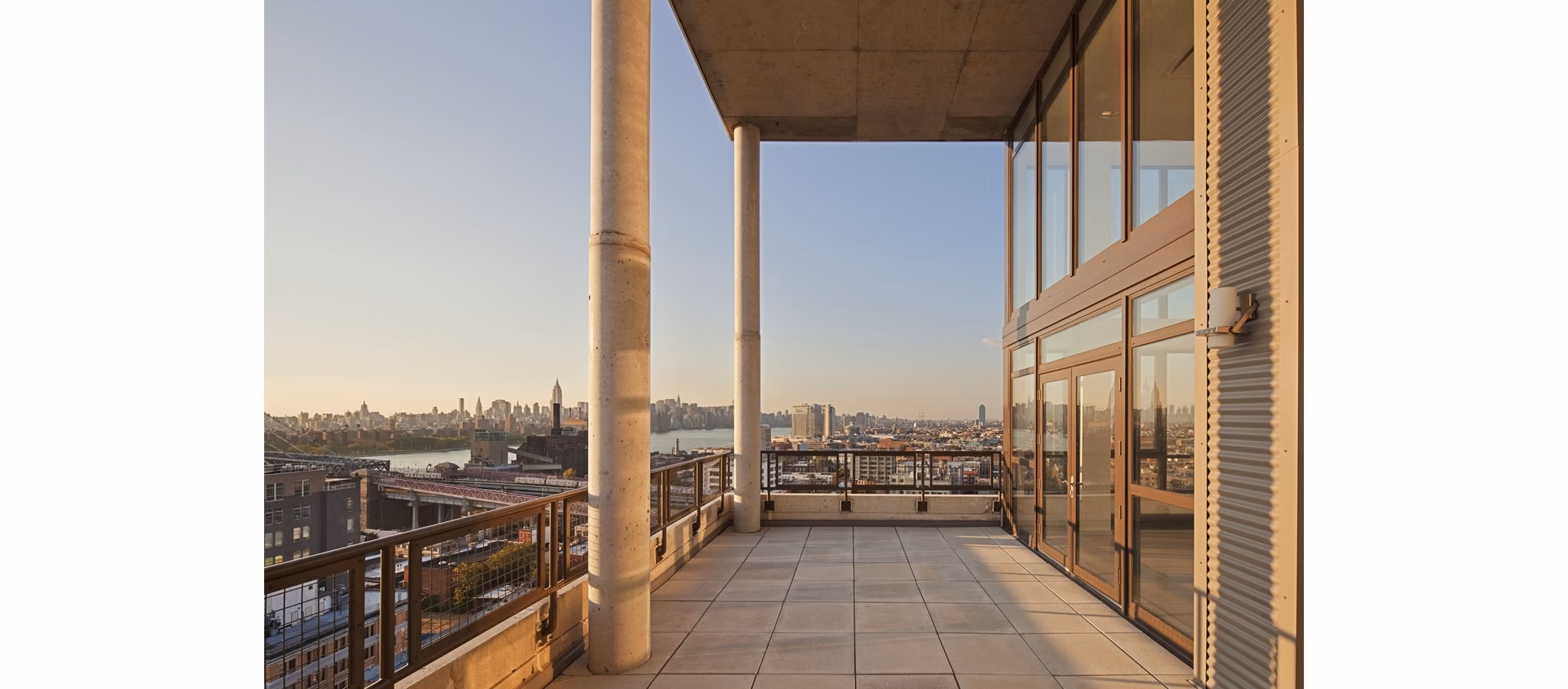 Patio with modern furniture at 424 Bedford luxury apartments, perfect outdoor space for relaxation