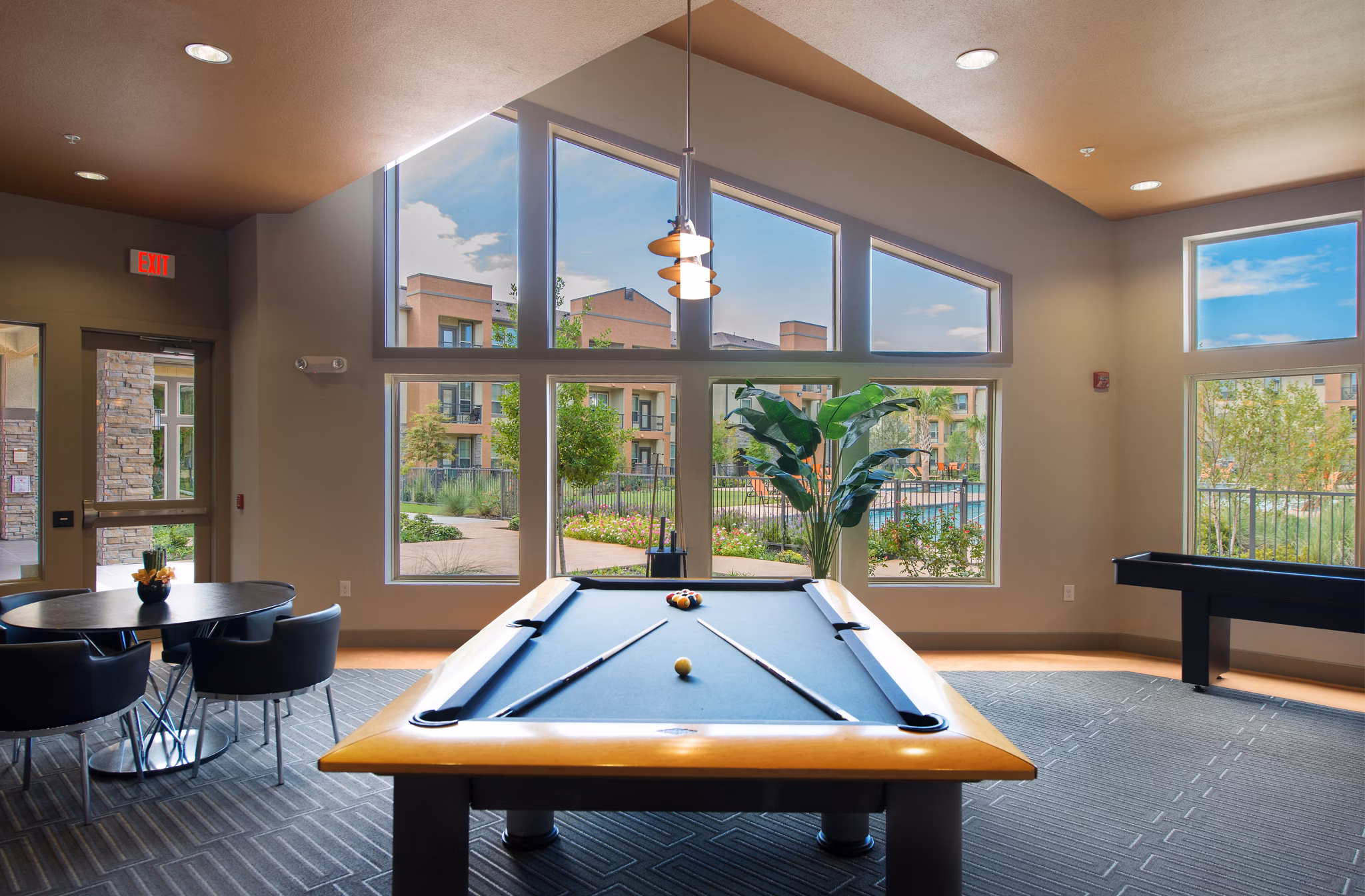 Retreat at Shadow Creek Ranch: Elegant clubhouse interior with modern design elements and cozy seating areas