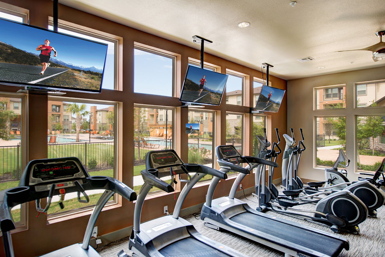 Modern fitness center with state-of-the-art equipment at Retreat at Shadow Creek Ranch
