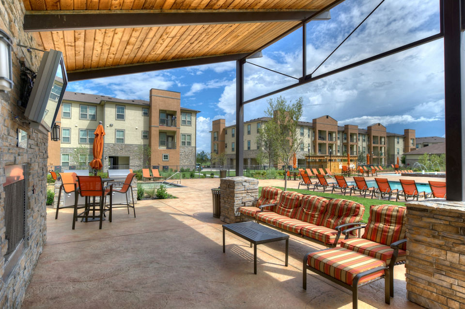 Spacious patio with comfortable seating at Retreat at Shadow Creek Ranch, offering serene outdoor living spaces in luxury surroundings