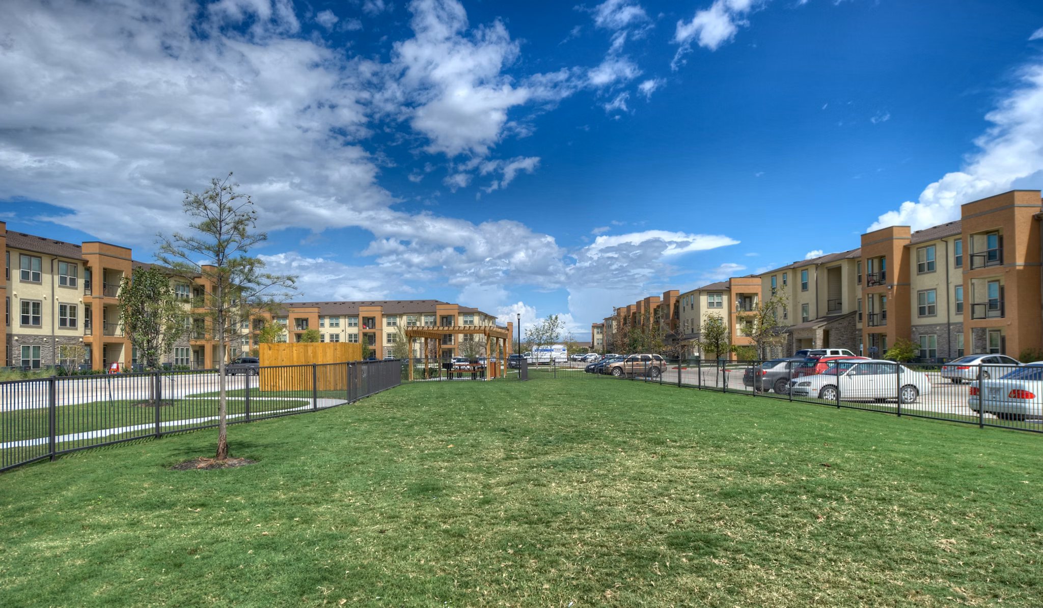 Outdoor grill area with modern seating at Retreat at Shadow Creek Ranch apartments