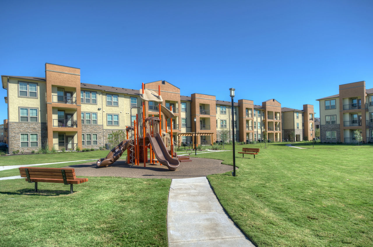 Playground with modern equipment at Retreat at Shadow Creek Ranch luxury apartments