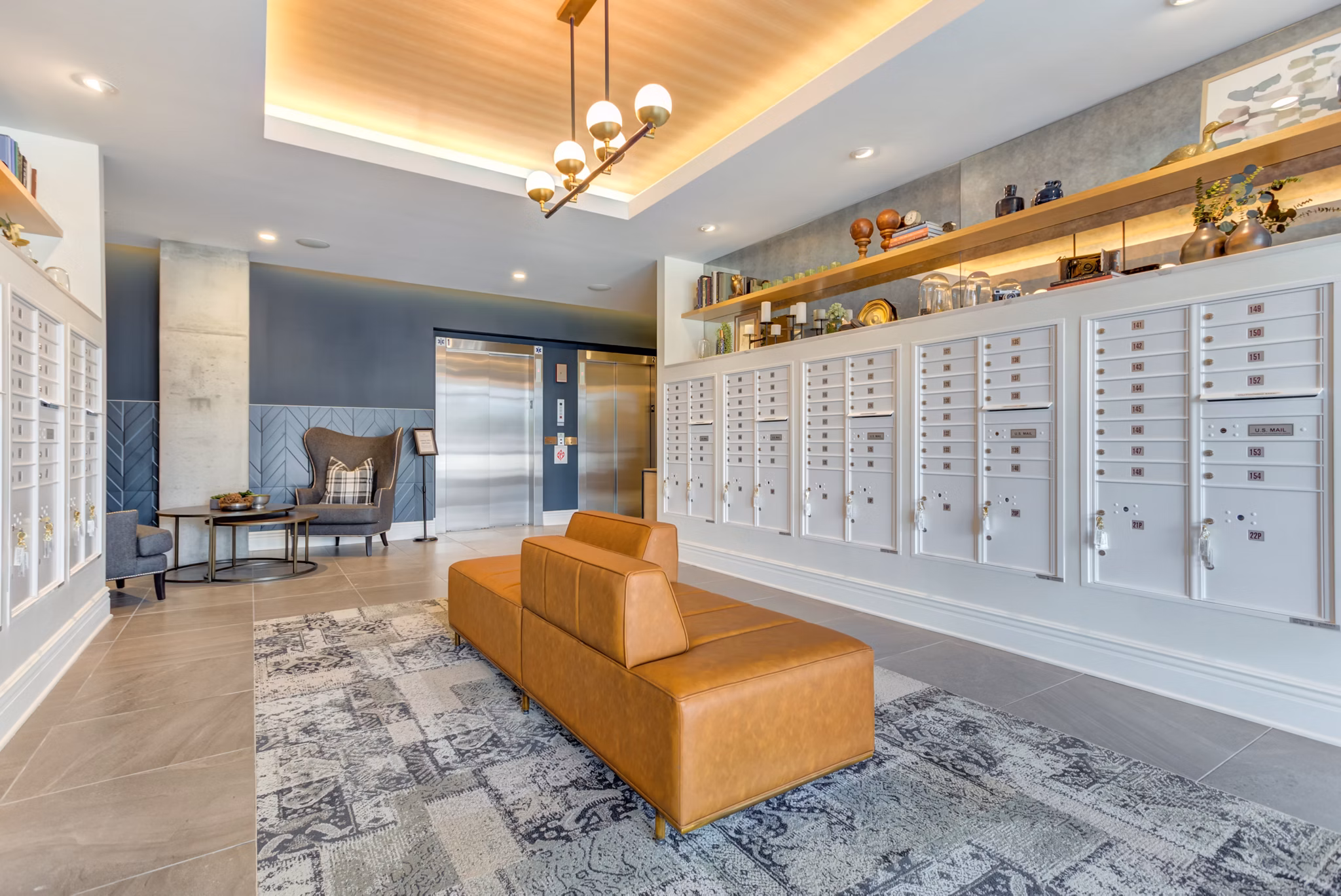 Mailroom with organized parcel lockers at The Marke of Elmhurst Apartments