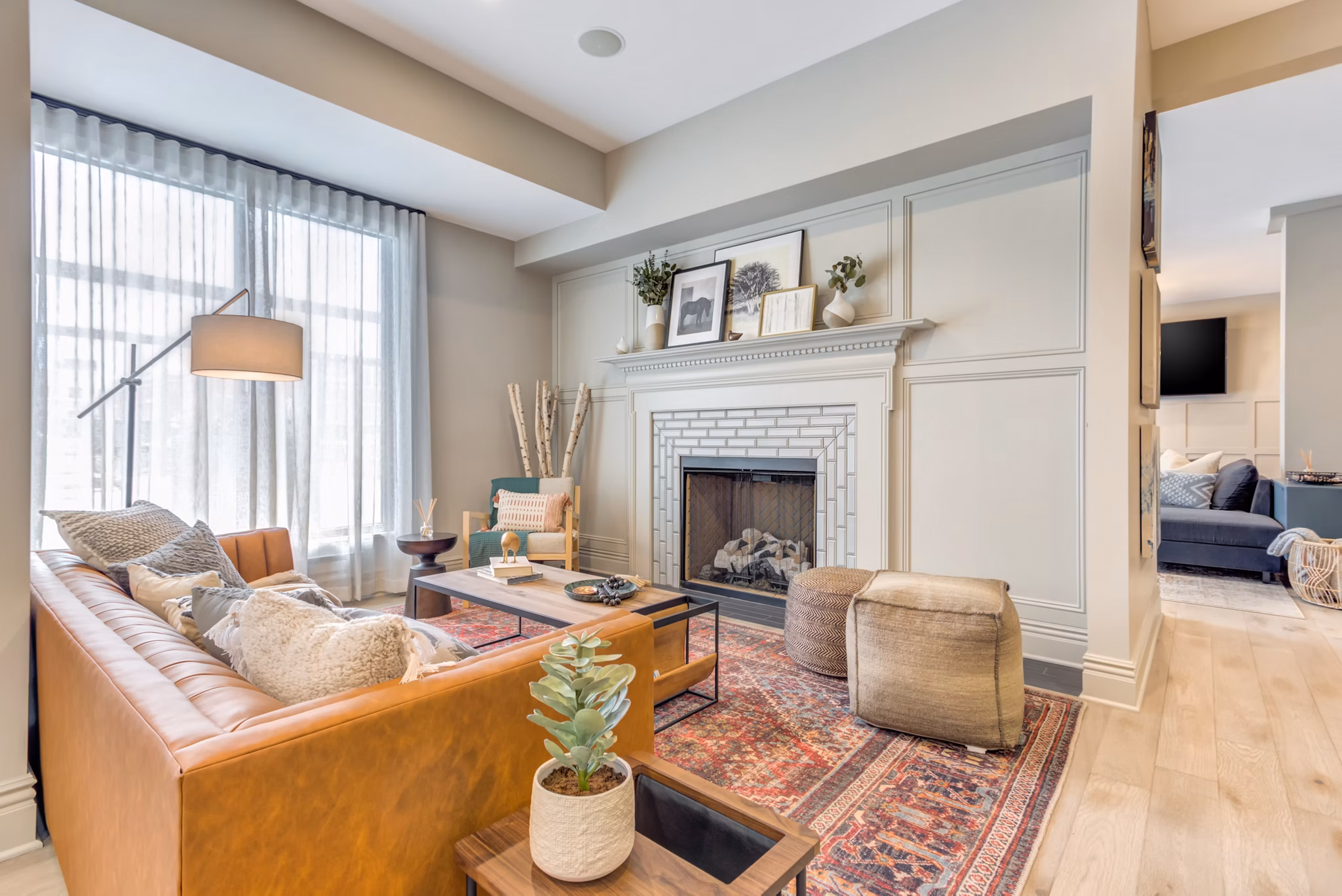 Clubhouse featuring modern design and seating at The Marke of Elmhurst Apartments, offering luxury living in a vibrant community environment