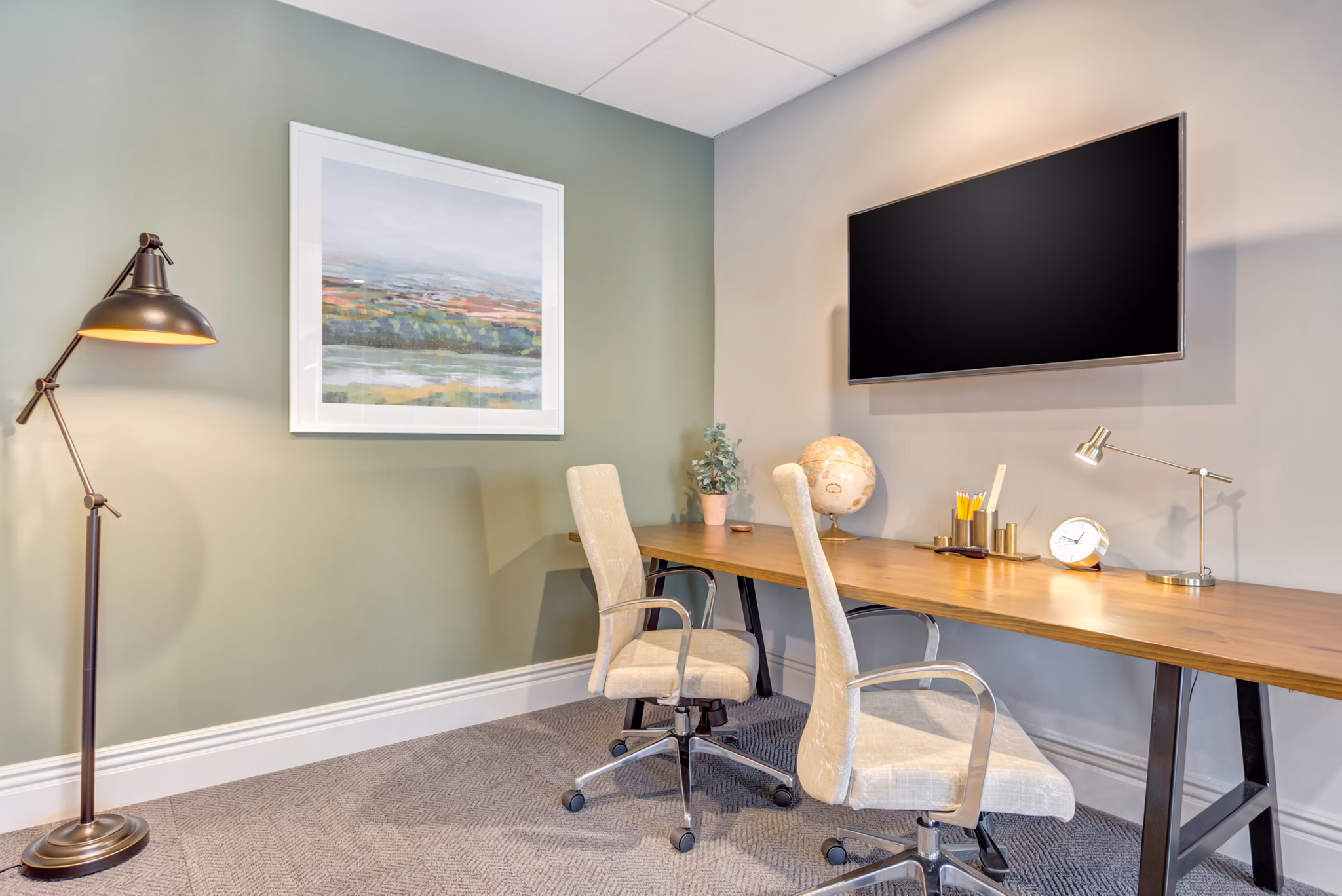 Clubhouse at The Marke of Elmhurst: Modern design with cozy seating and entertainment options for residents