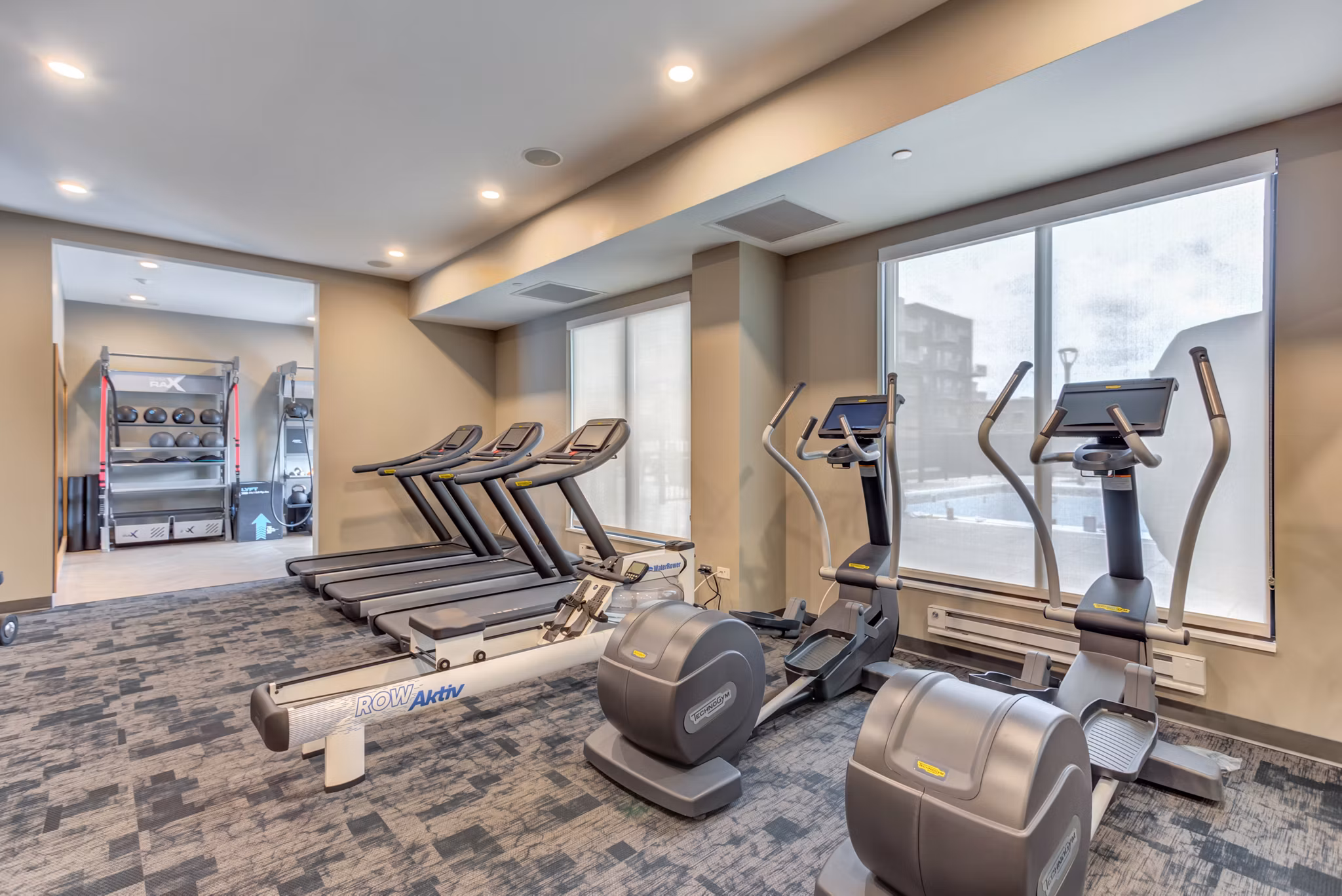 Fitness center with state-of-the-art equipment at The Marke of Elmhurst Apartments