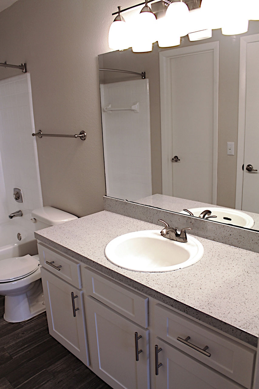 Bathroom featuring modern fixtures at Island Club Apartments, luxurious living in a vibrant community