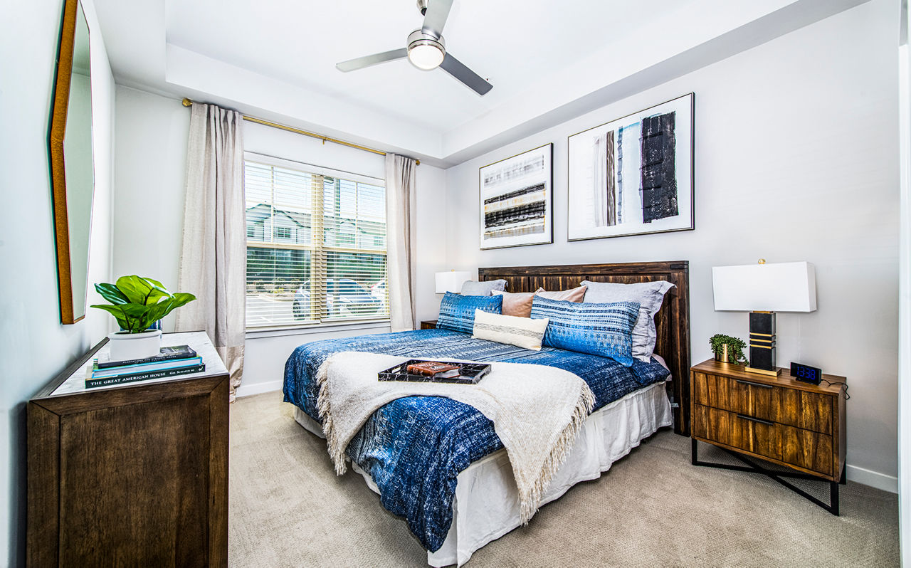 Spacious bedroom with modern decor at Overture Greenville Apartments