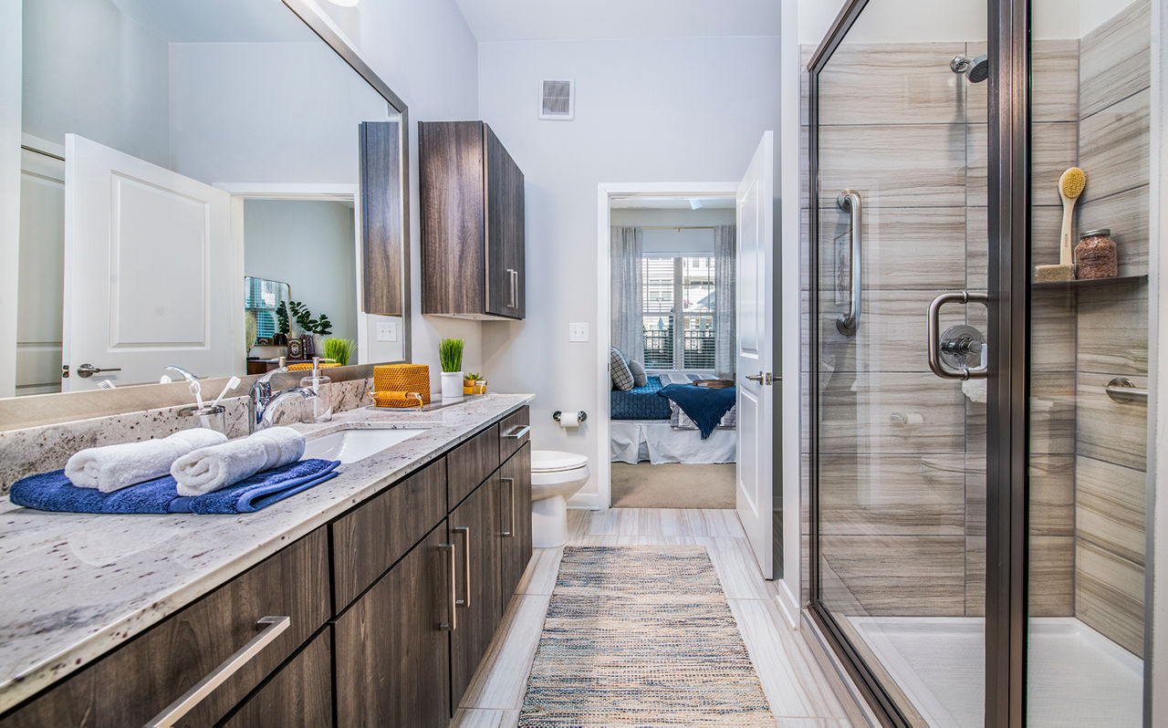 Luxurious bathroom featuring modern design elements at Overture Greenville Apartments, Greystar property