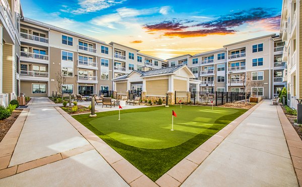 putting green at Overture Greenville Apartments