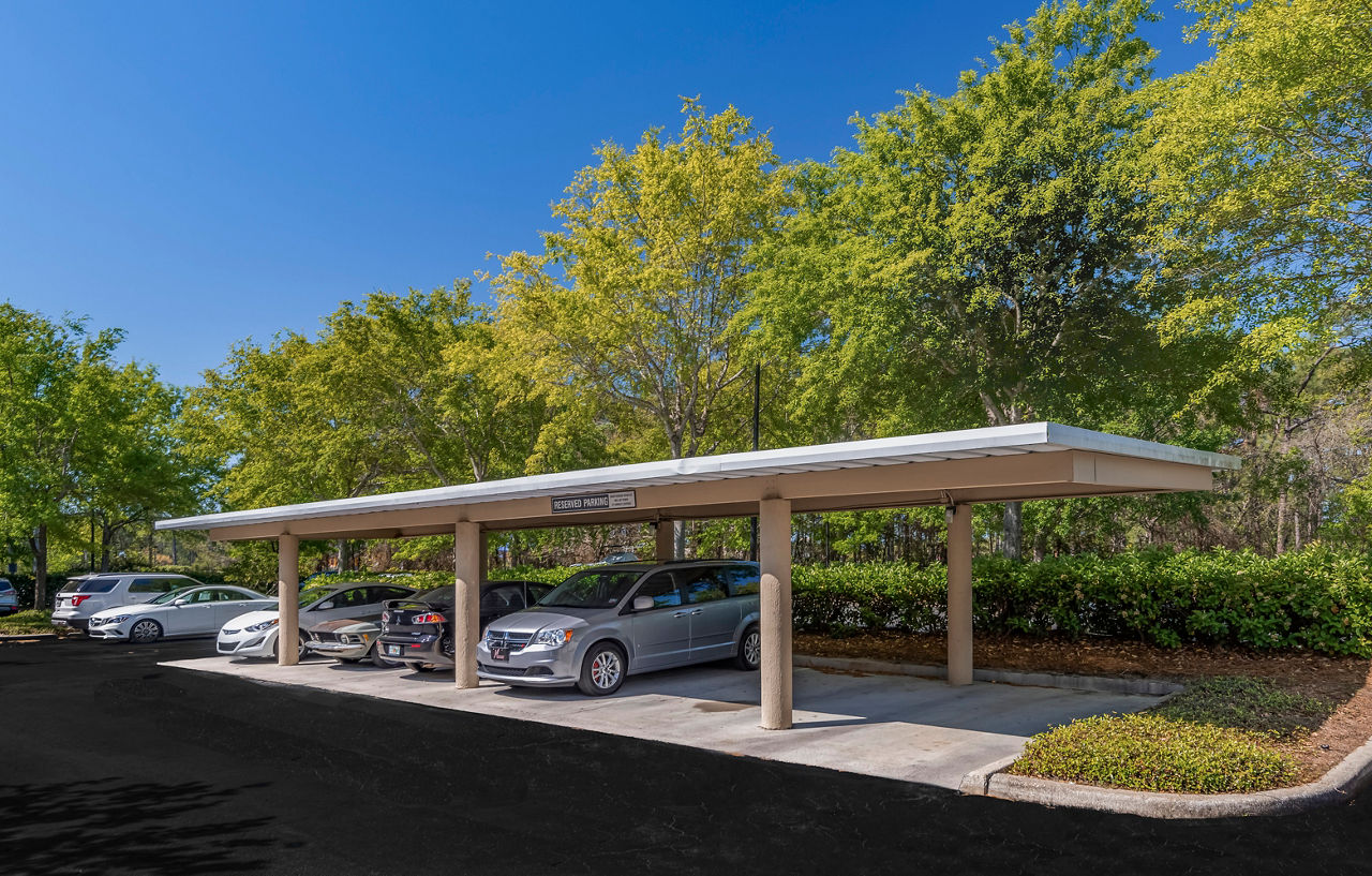 Covered parking garage at Legacy On The Bay Apartments with ample spaces