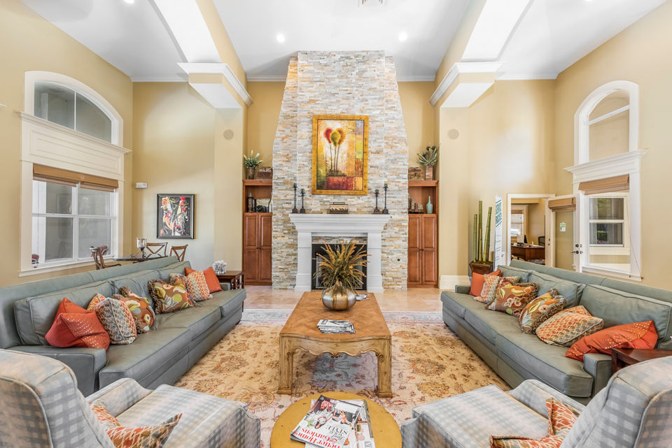 Welcoming clubhouse with modern seating at Legacy On The Bay Apartments, perfect for community events and gatherings