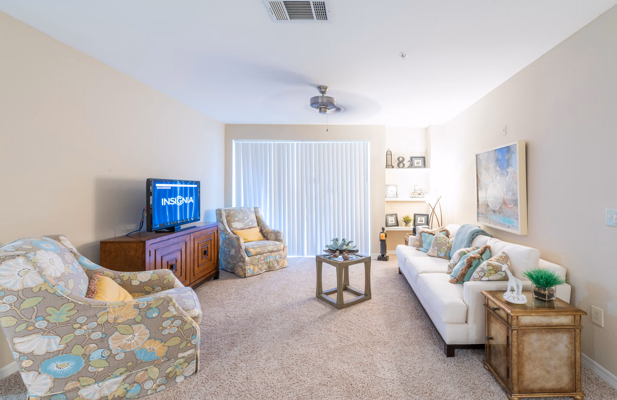 Modern living room with elegant furnishings at Legacy On The Bay Apartments, perfect for relaxation and entertainment in a luxurious setting