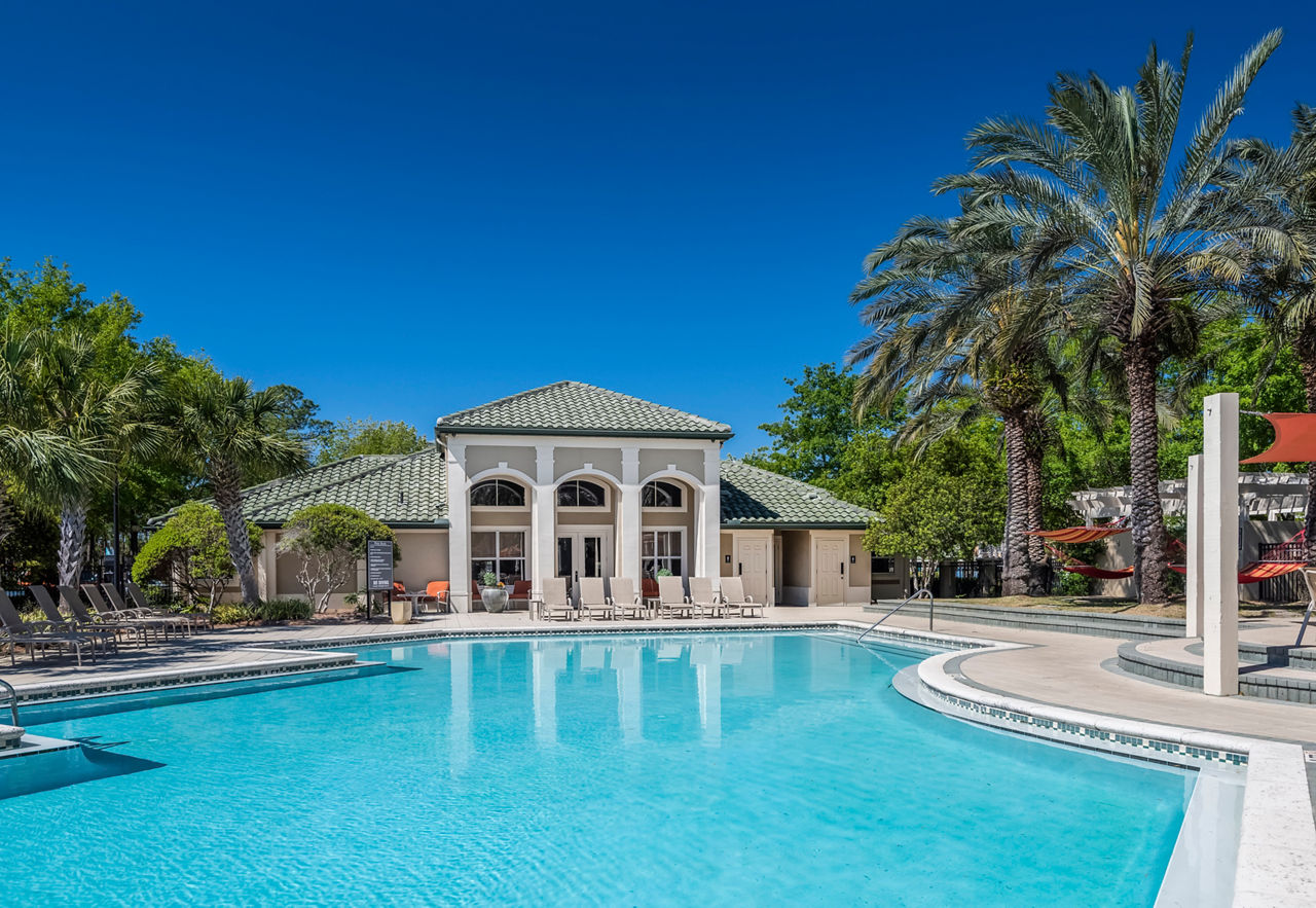 Inviting outdoor pool at Legacy On The Bay Apartments, ideal for relaxation and recreation