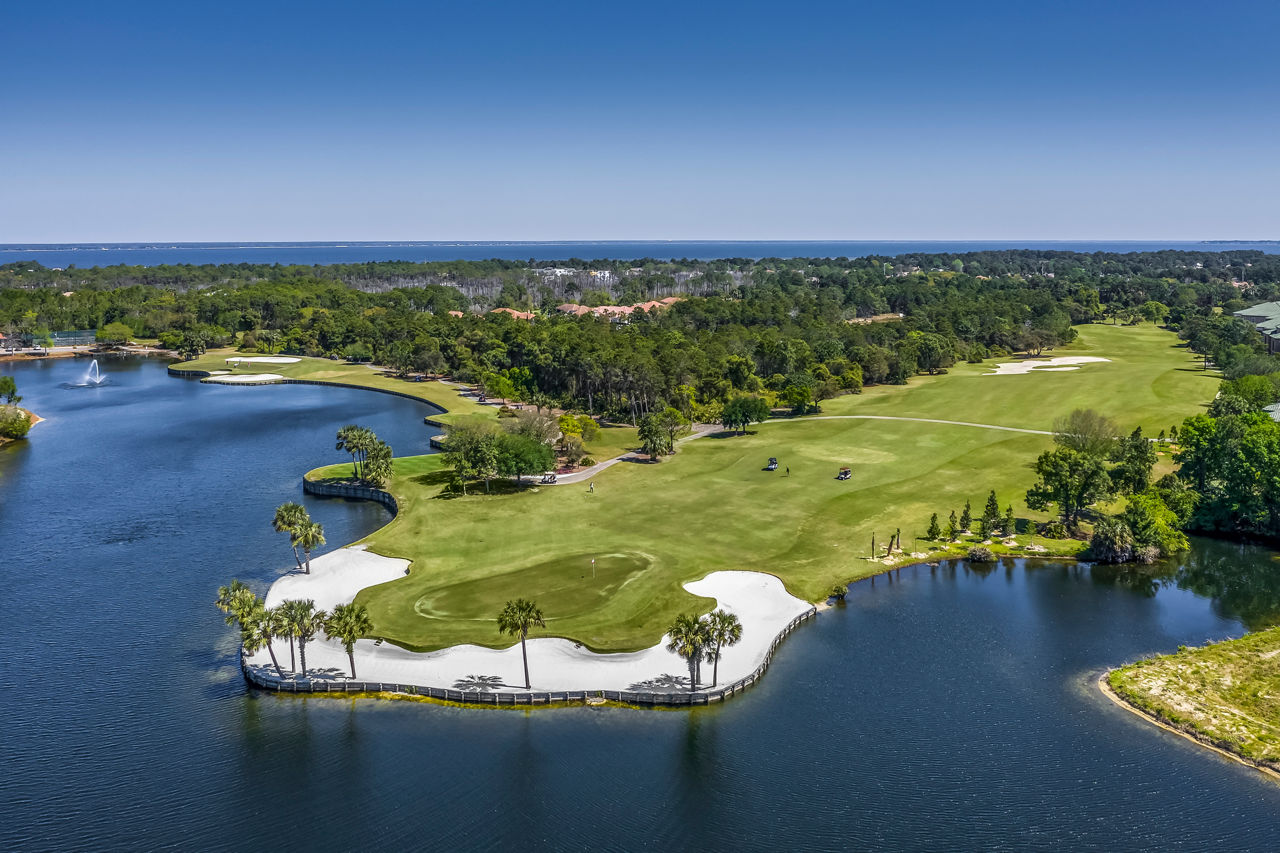 Scenic view of pristine bay from Legacy On The Bay Apartments balcony