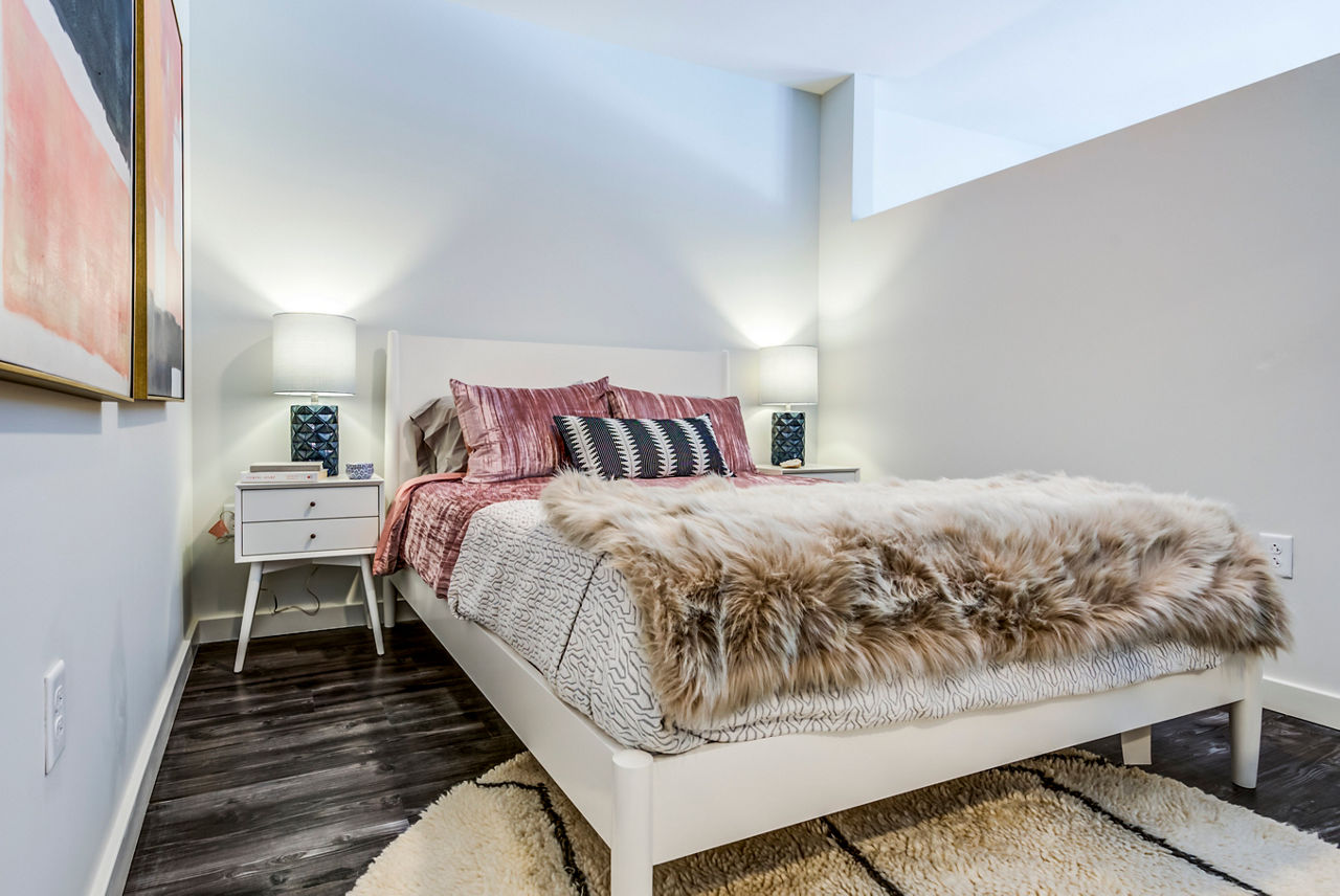 Modern bedroom with contemporary decor at City Centre Ithaca Apartments