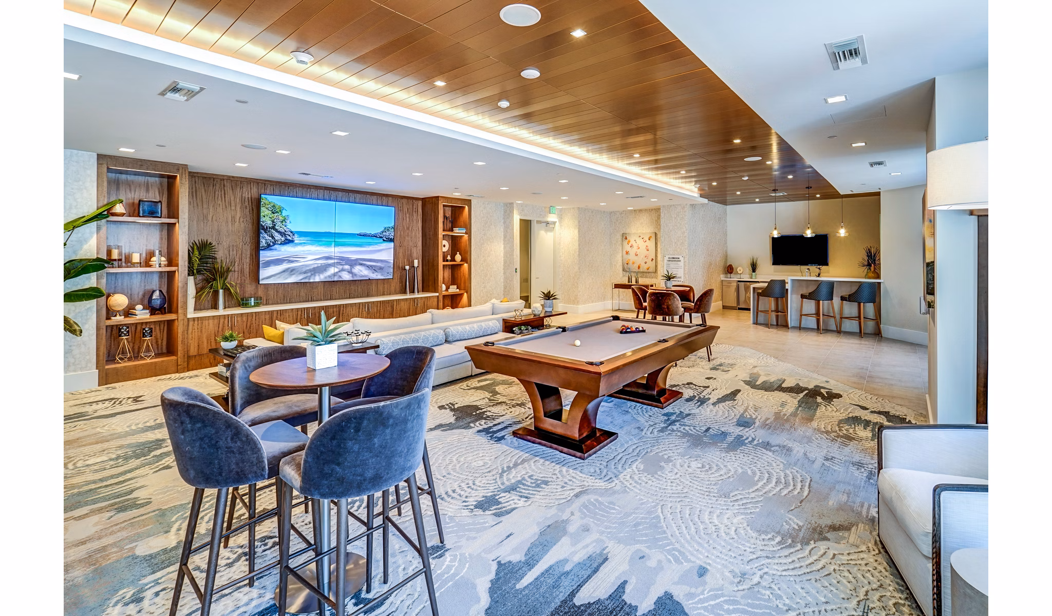 Clubhouse with modern furnishings at Oversea at Flagler Banyan Square Apartments
