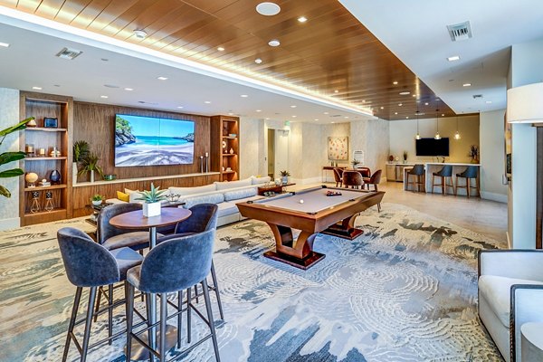 Clubhouse with modern furnishings at Oversea at Flagler Banyan Square Apartments