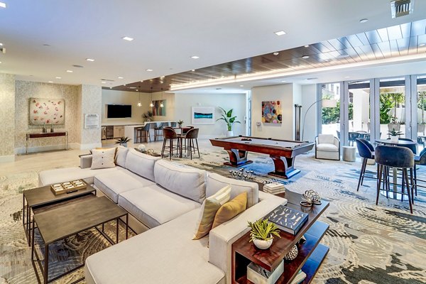 Modern clubhouse with elegant seating at Oversea at Flagler Banyan Square Apartments, a Greystar luxury community in West Palm Beach, FL