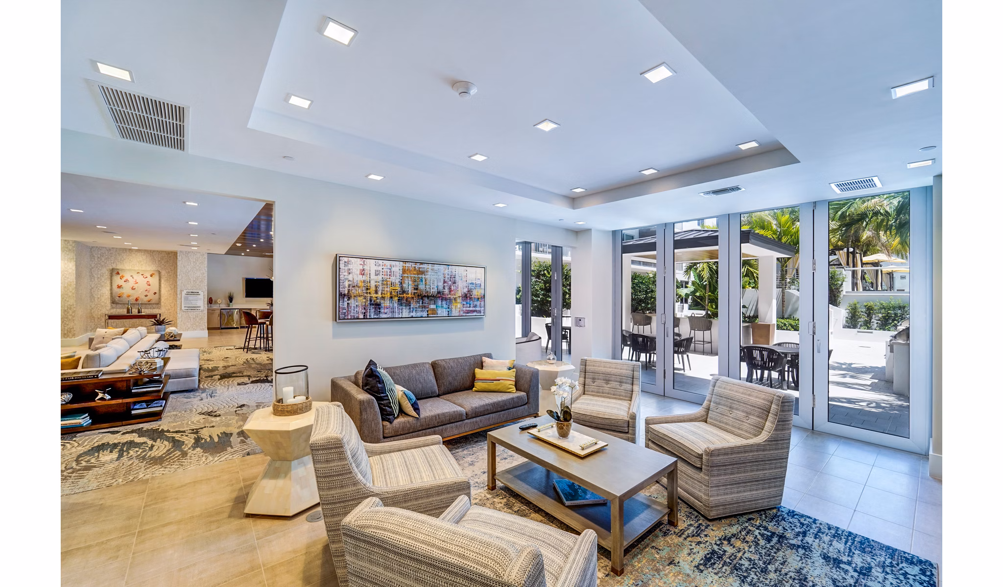 Clubhouse featuring modern design at Oversea at Flagler Banyan Square Apartments