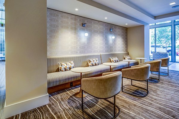 Clubhouse with modern design elements at Oversea at Flagler Banyan Square Apartments