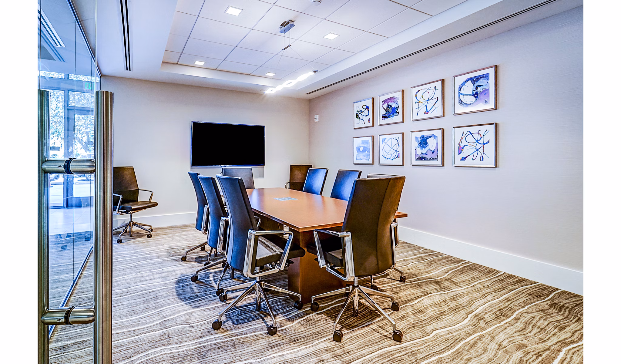 Modern meeting facility with state-of-the-art equipment at Oversea at Flagler Banyan Square Apartments, perfect for tenant gatherings and events